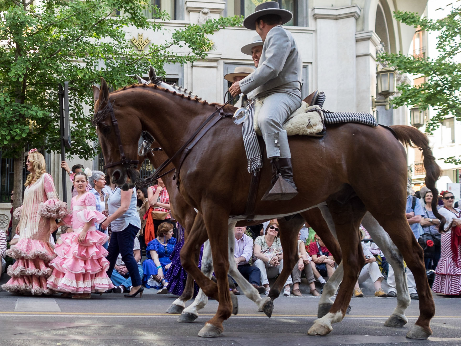 Street parade during the Las Cruces de Mayo in Granada