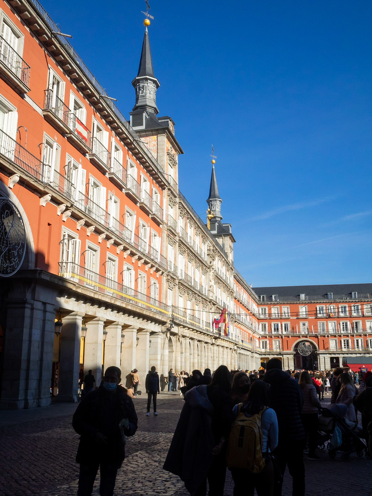 Pedestrians silhouettes in Plaza Mayor, Madrid
