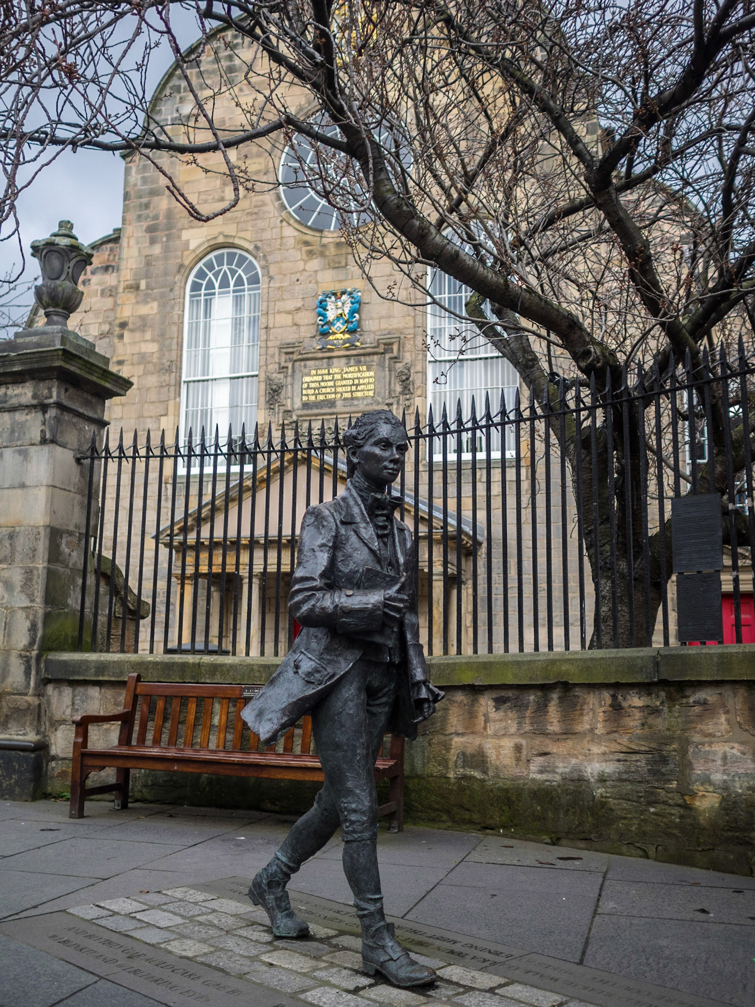 Statue of Robert Fergusson, outside Canongate Kirk