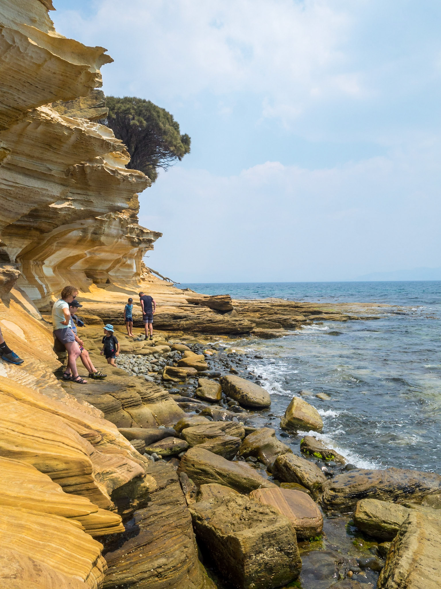 People asking along Maria Island Painted Cliffs