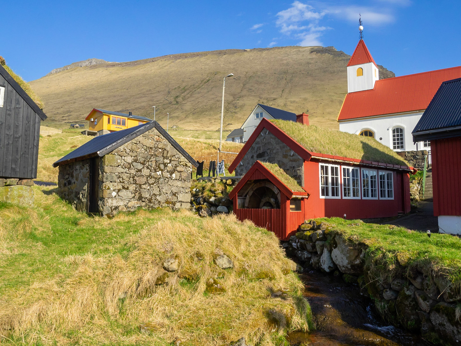 Old water mill in Mikladalur hamlet