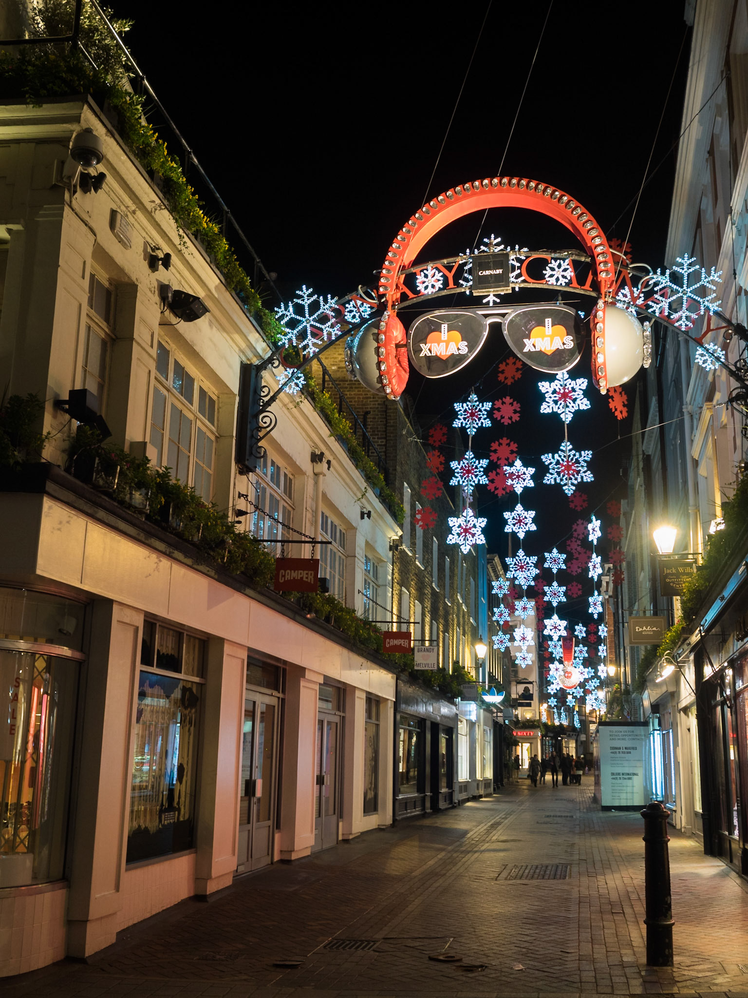 Carnaby Street 2014 Christmas decorations glowing in the night in the empty street