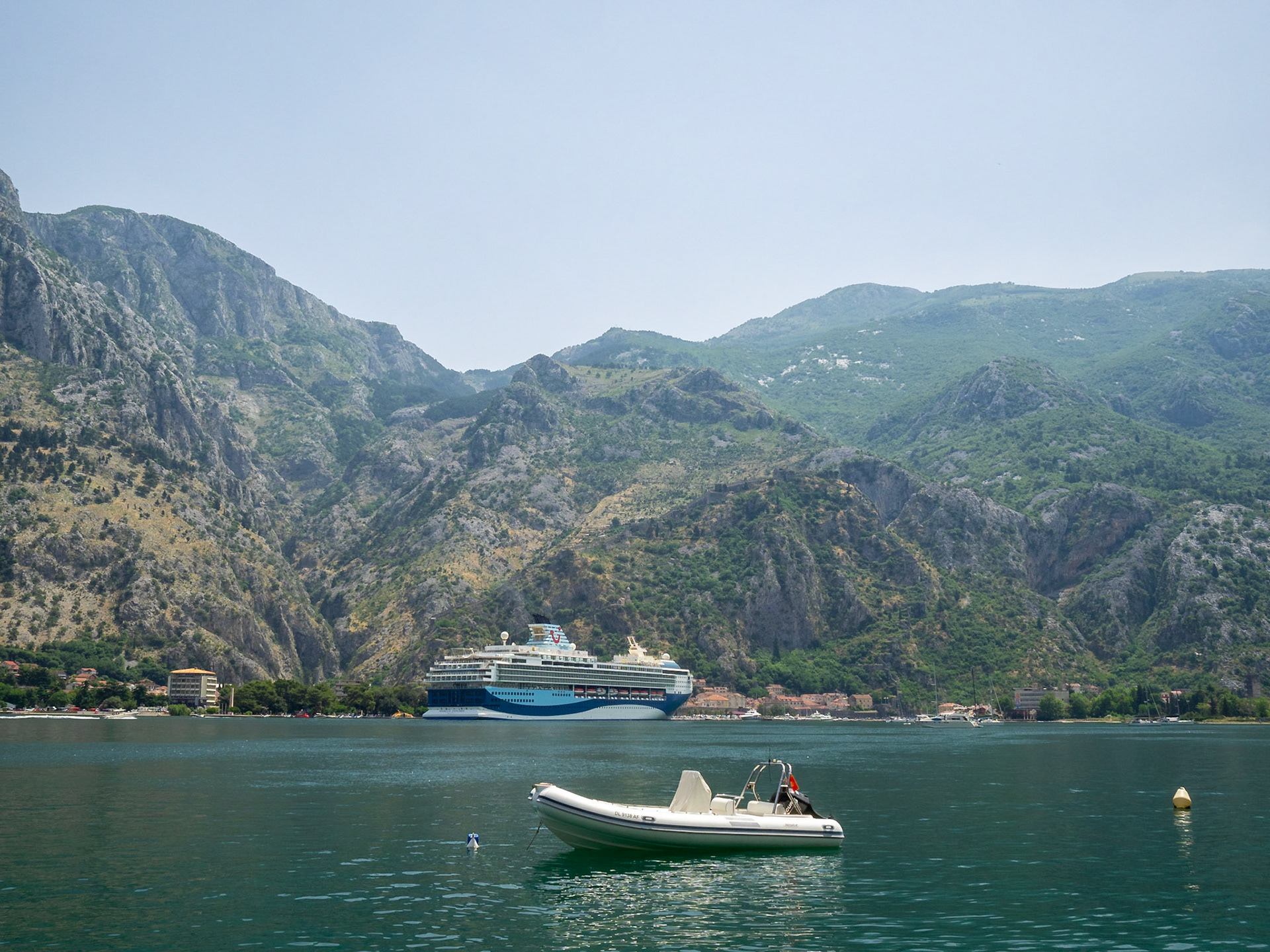 Cruise ship by the mountains of the Bay of Kotor, Montenegro
