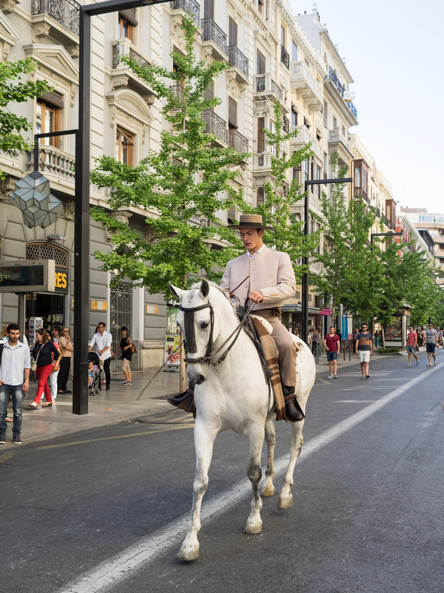 Street parade during the Las Cruces de Mayo in Granada