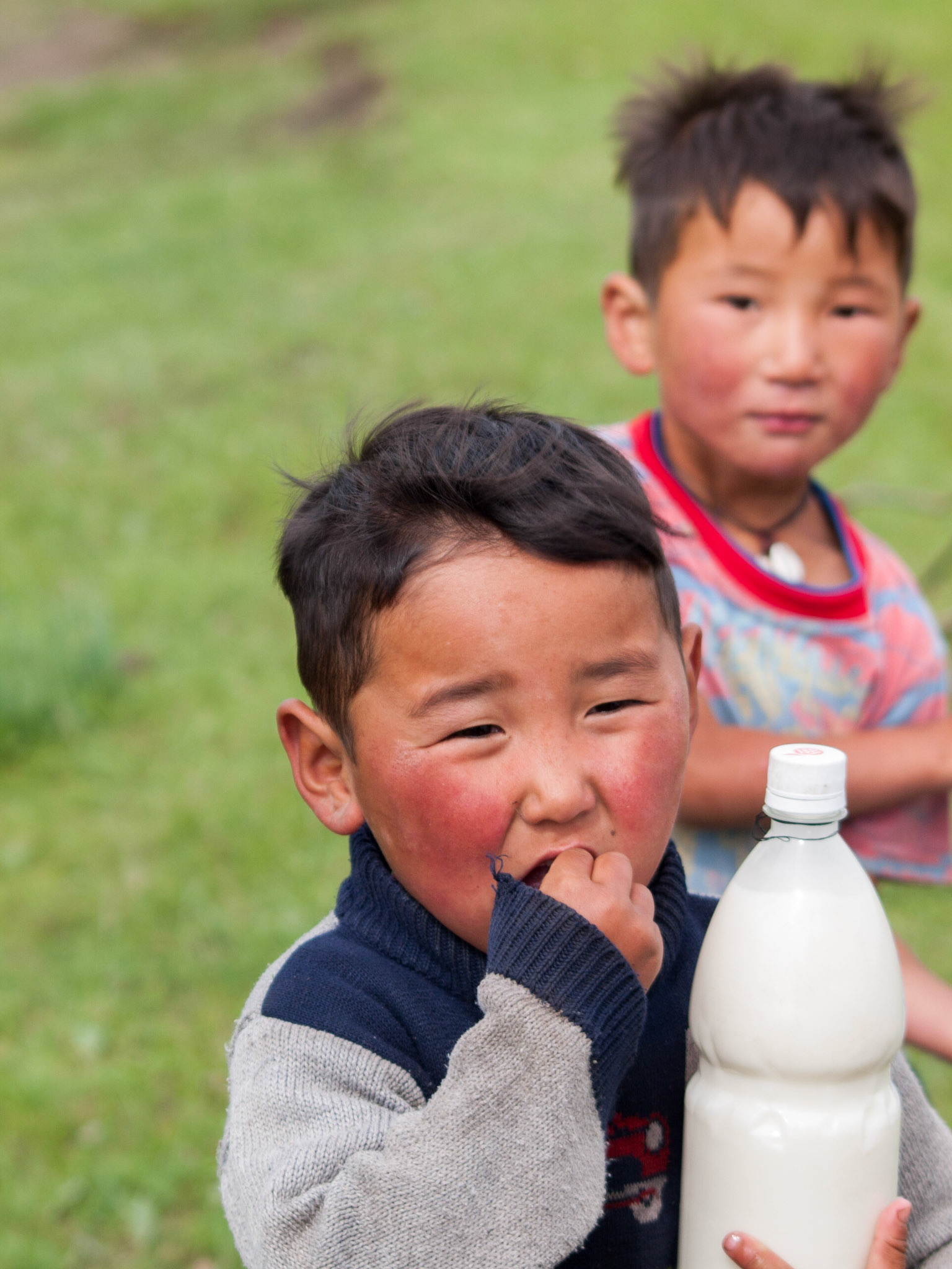 Mongolian children selling airag