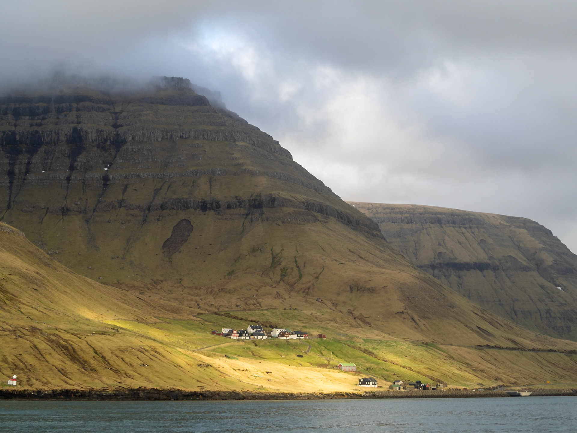 Syðradalur hamlet in the Botnstindur mountain slop, Kalsoy