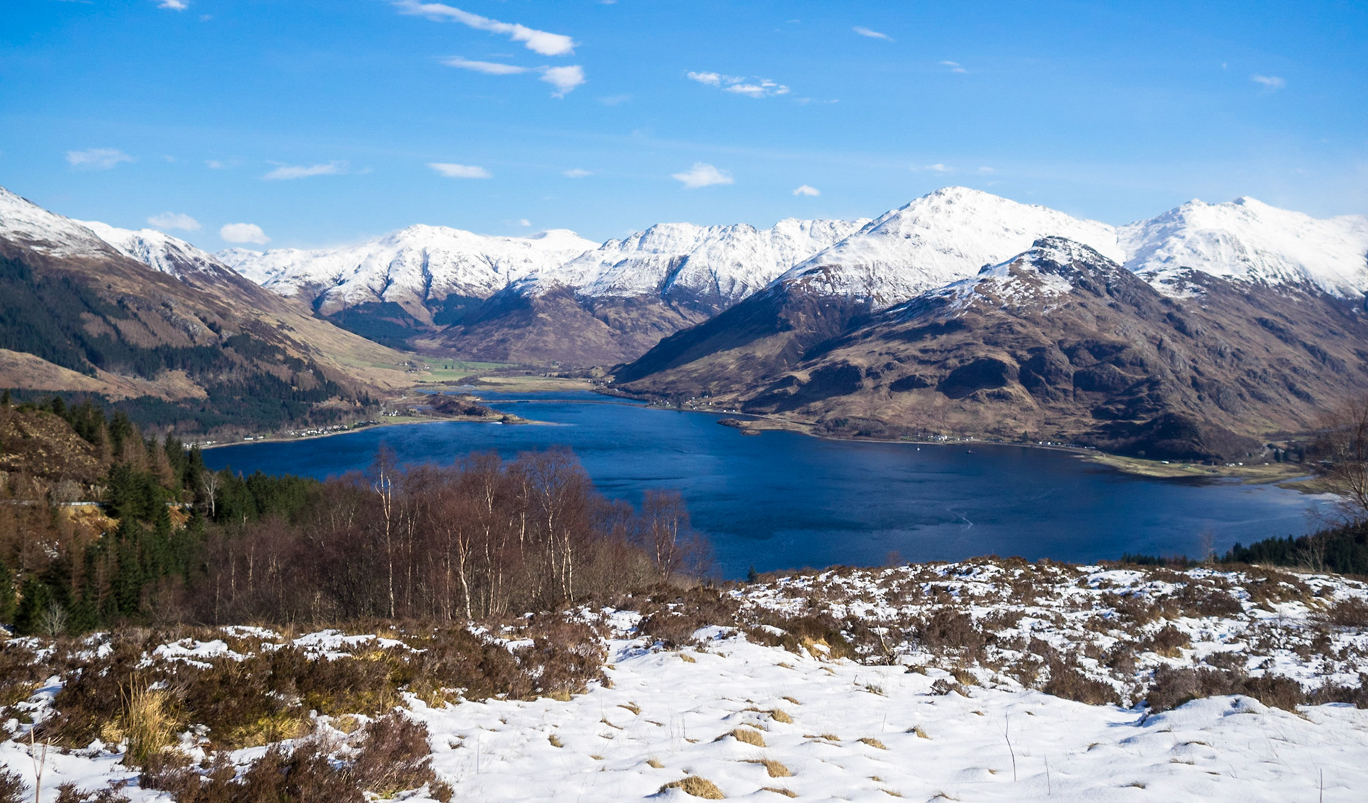 Five Sisters of Kintail mountains peaks  over Loch Duich