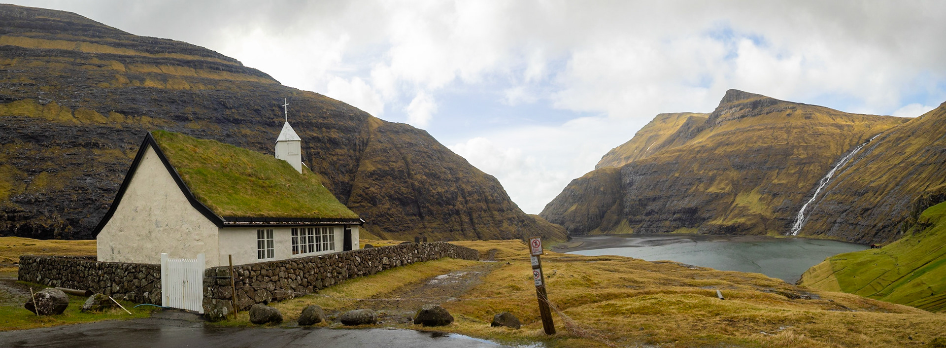 Saksun turf roofed church by the black sand tidal lagoon