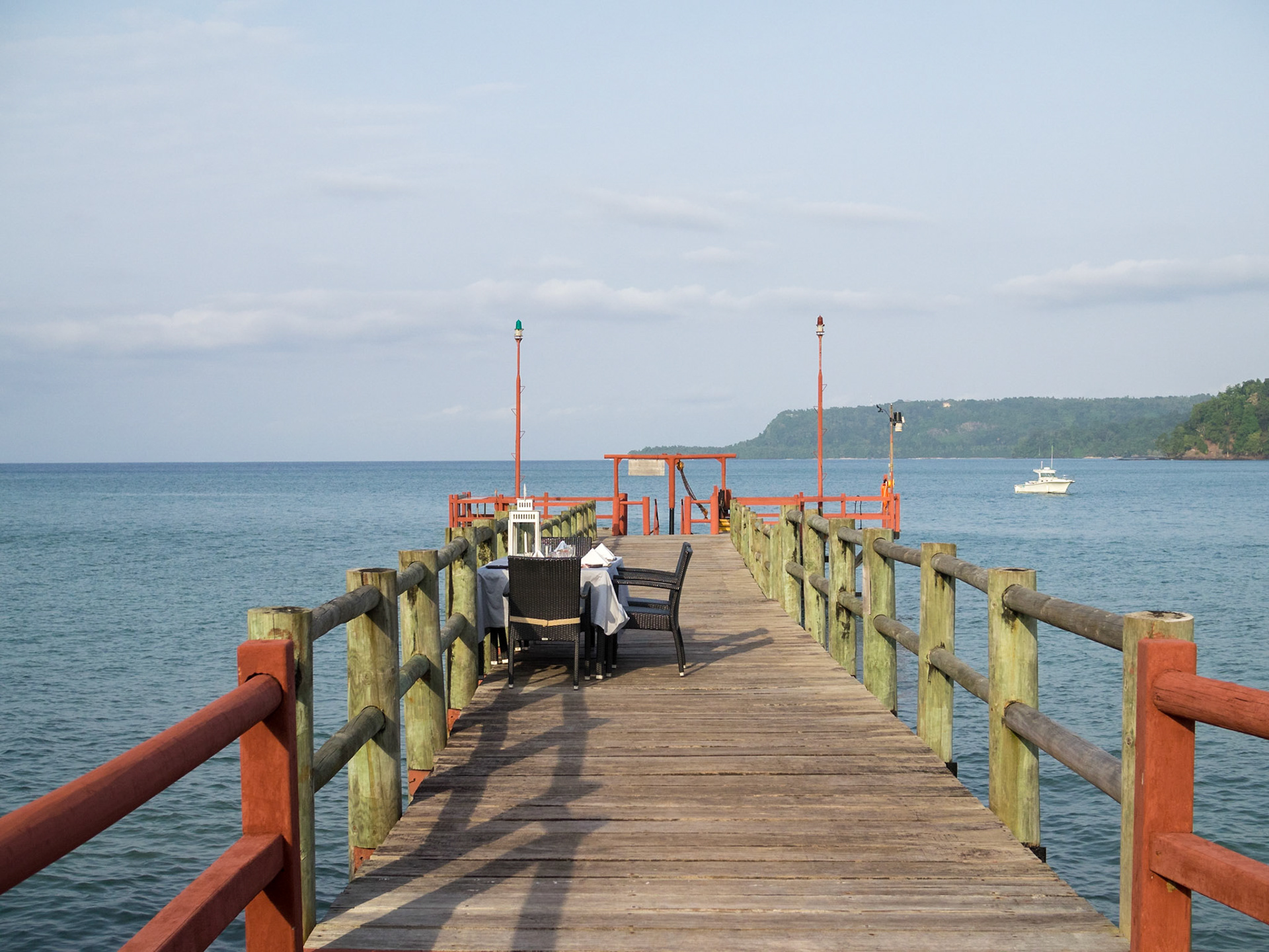 Dinner table set in the over the sea pier
