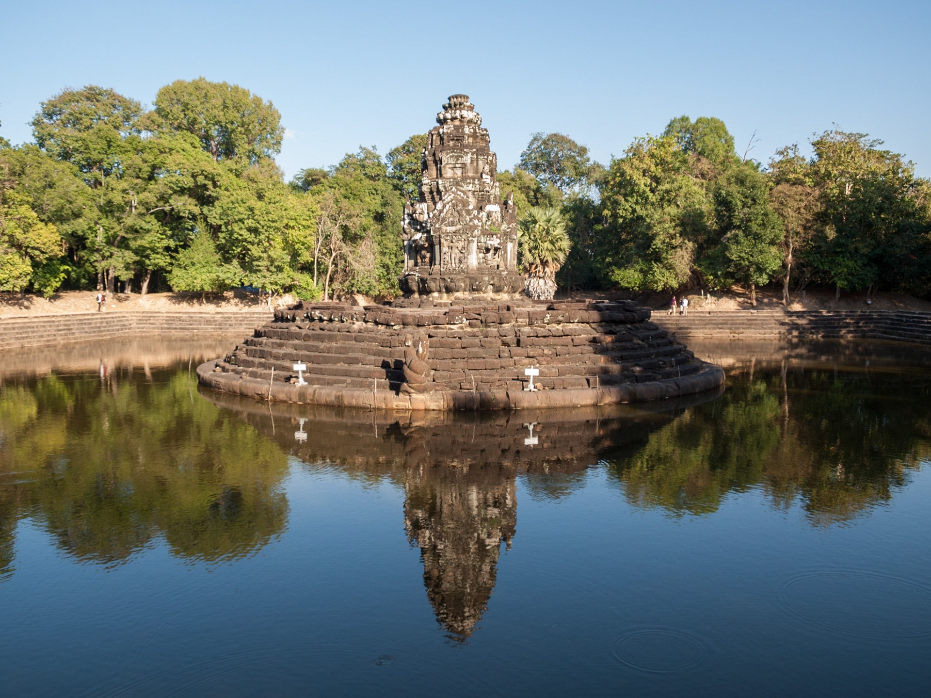 Preah Neak Pean a Buddhist temple from the late 12th century formed by a large square pool, surrounded by four smaller ones, and a central island