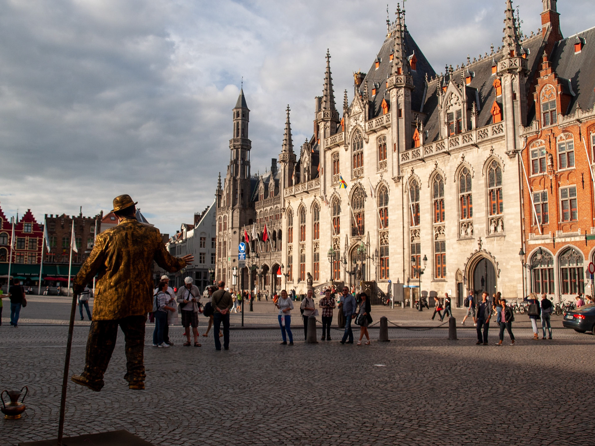 Statue man in Bruges Markt square