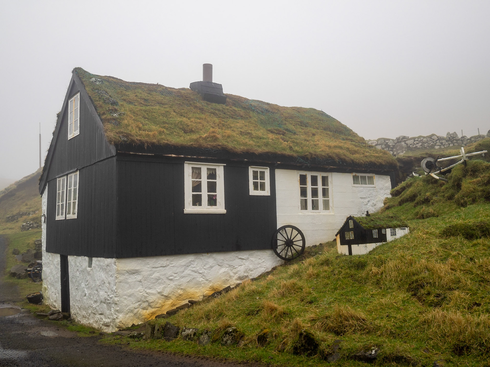 Mykines turf roofed house with smaller model on the side