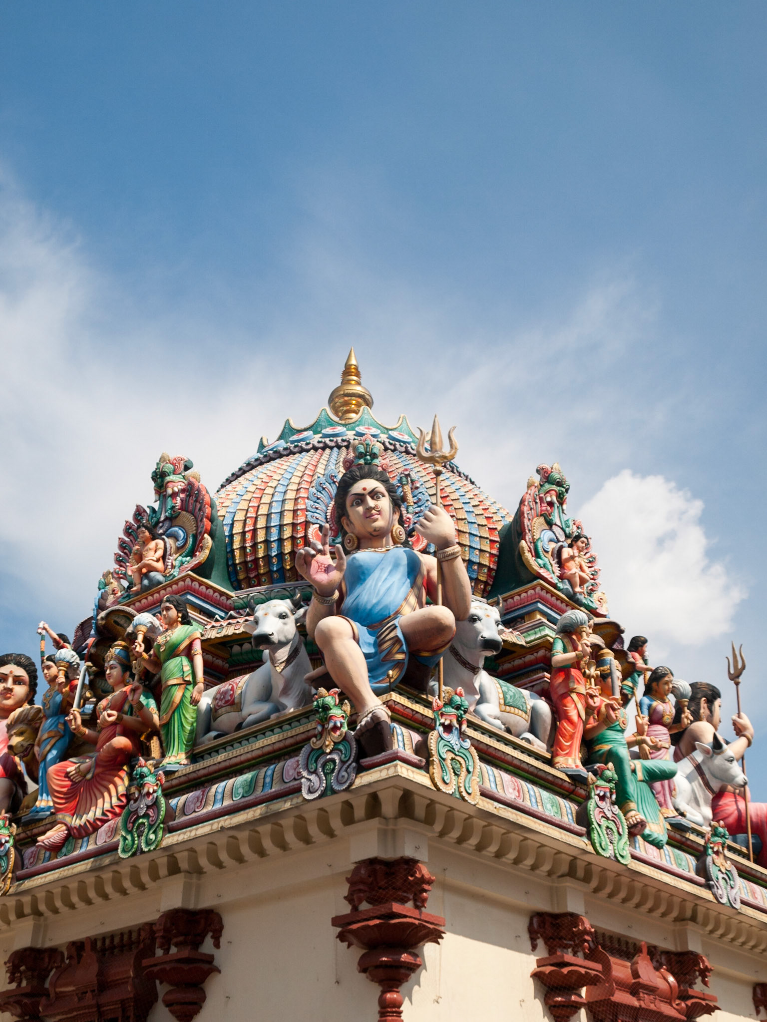 Colorful god's sculpture in Sri Mariamman Temple