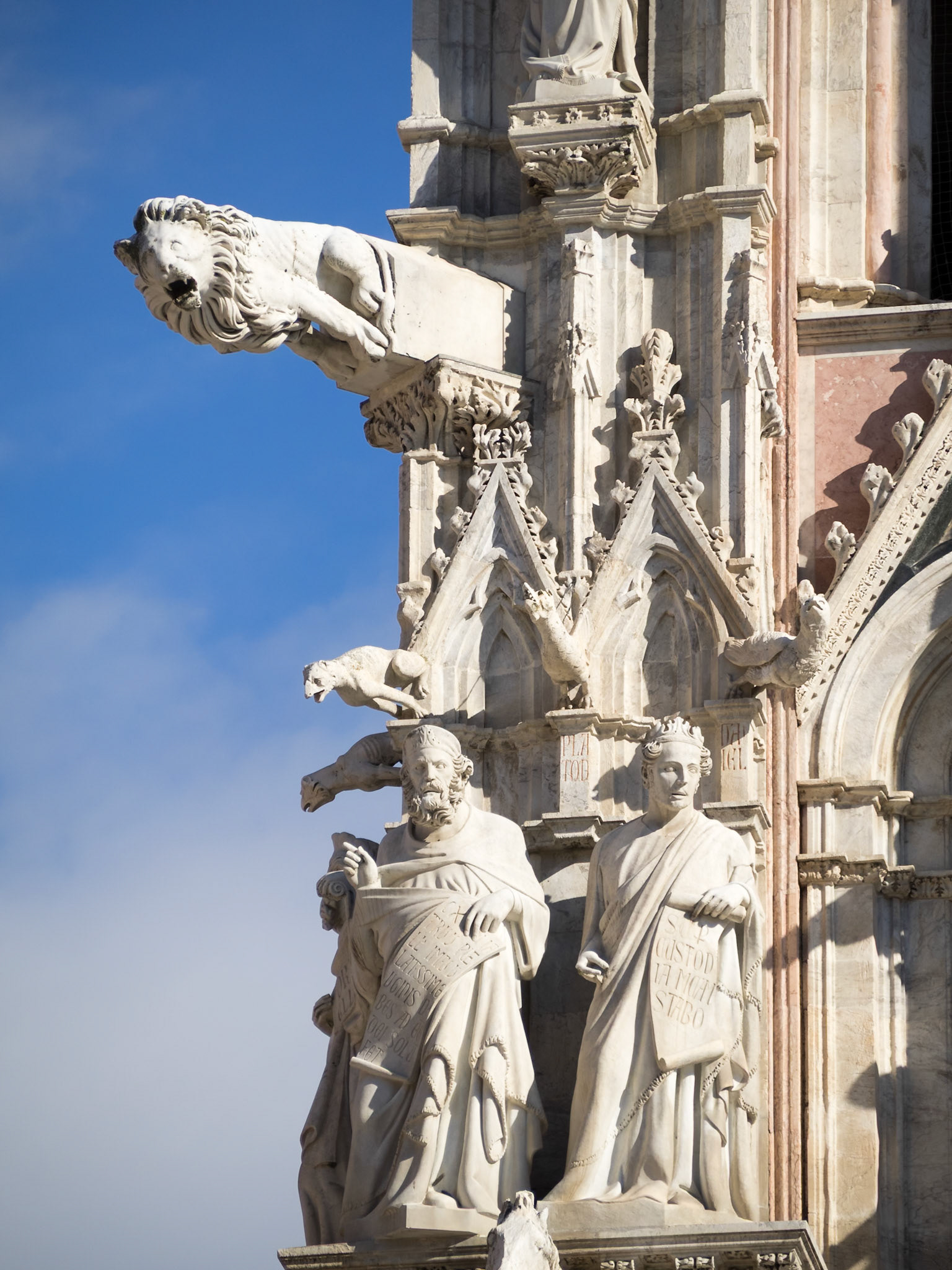 Gargoyles and Saints from the facade of Siena Duomo