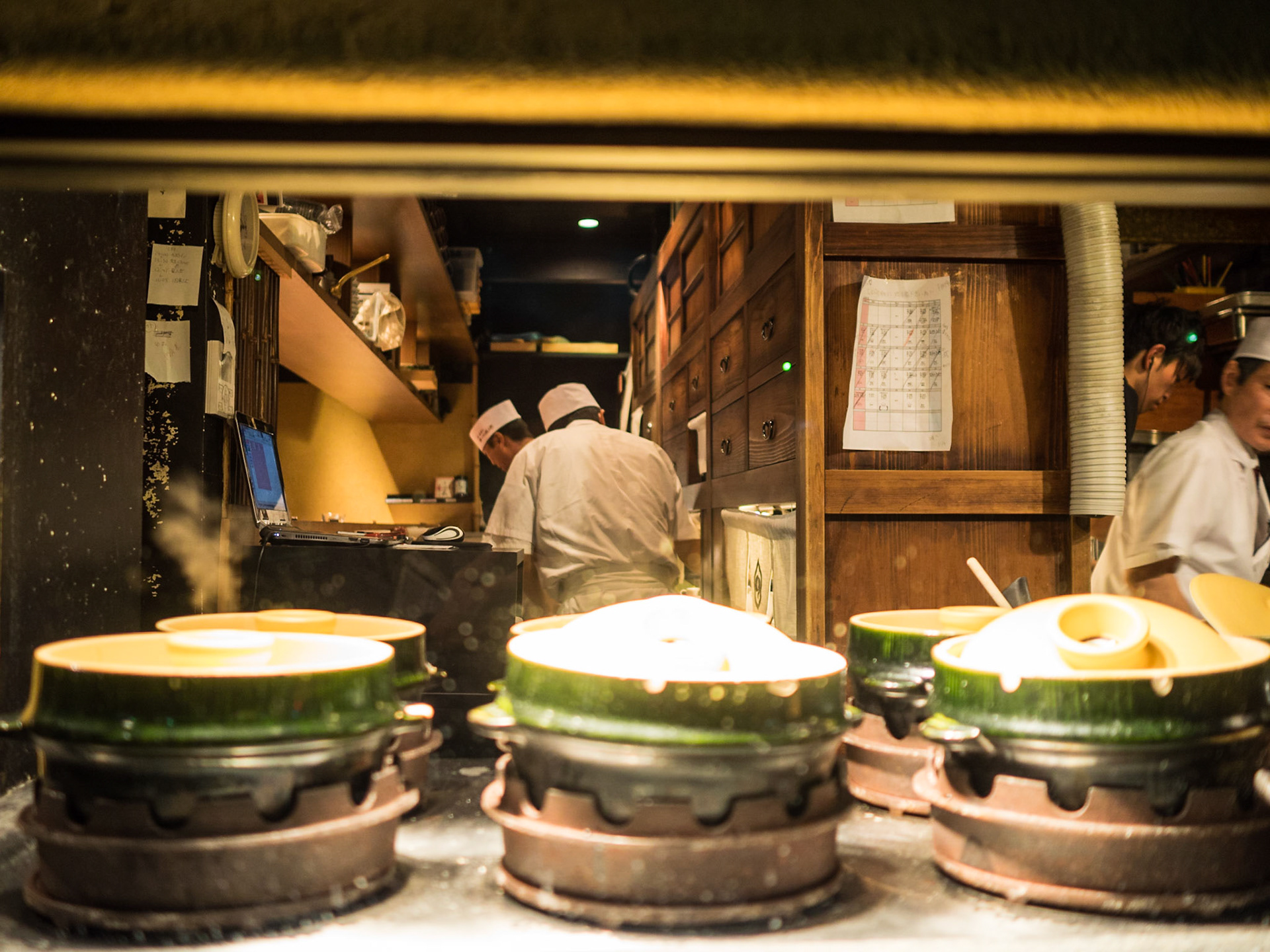 Looking inside a Kyoto restaurant kitchen from the street