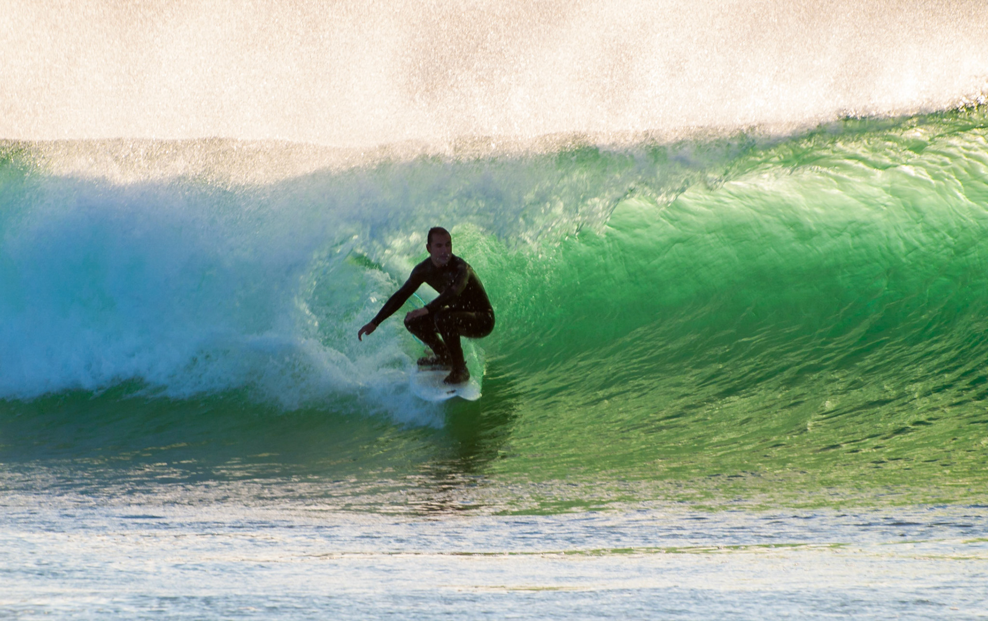Surfer in Supertubos beach