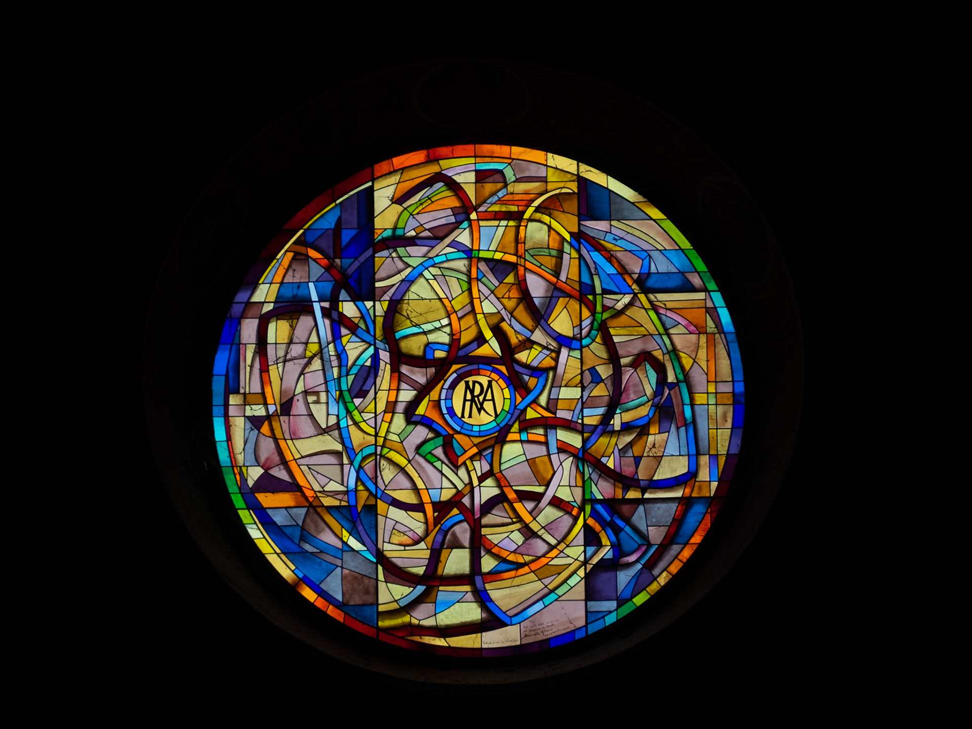 Stained glass window of San Gimignano Cathedral