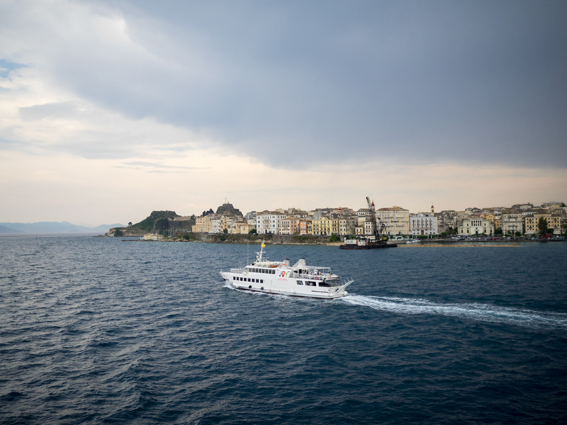 Jetfoil passing by Corfu town seafront