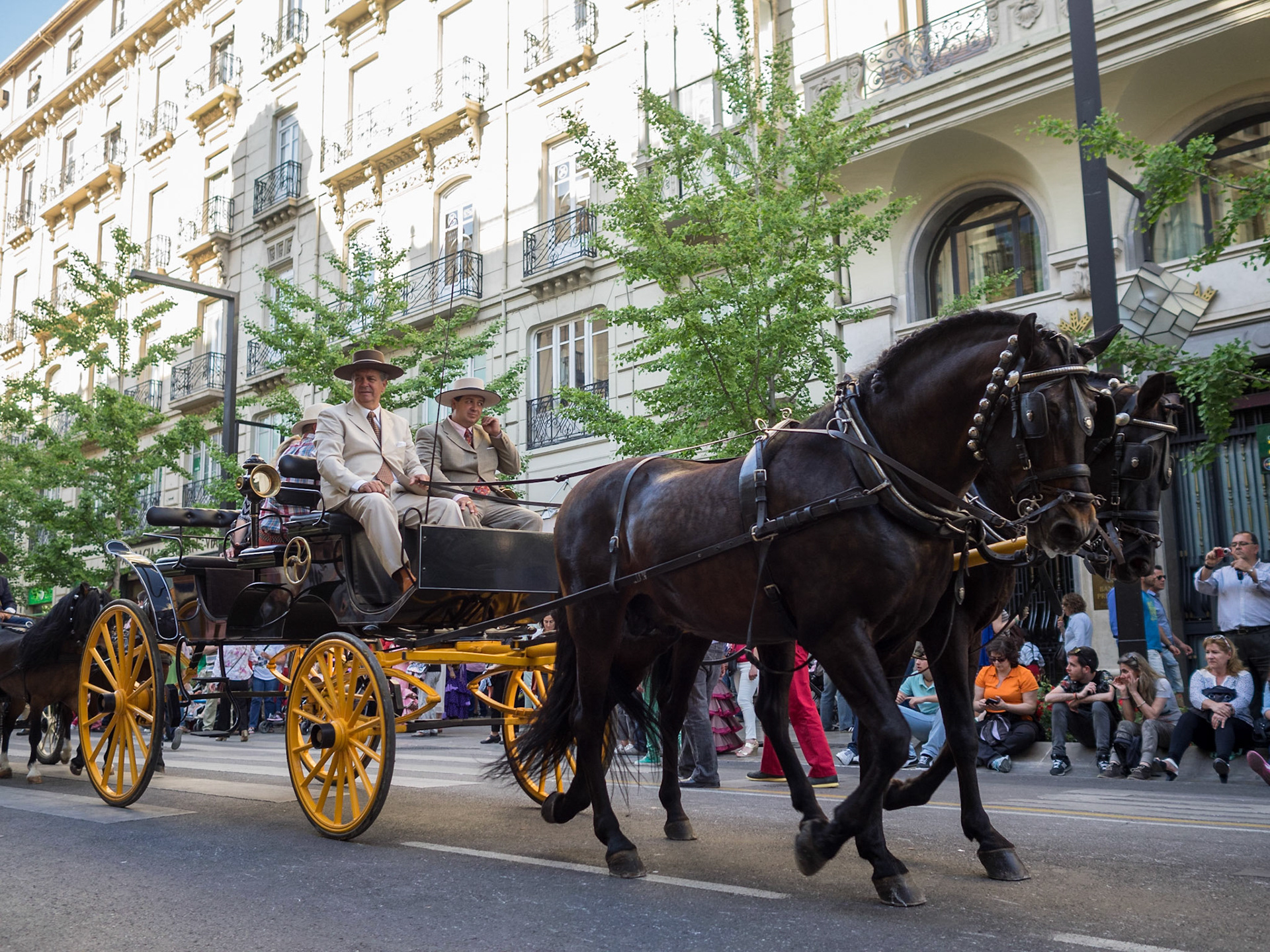 Street parade during the Las Cruces de Mayo in Granada