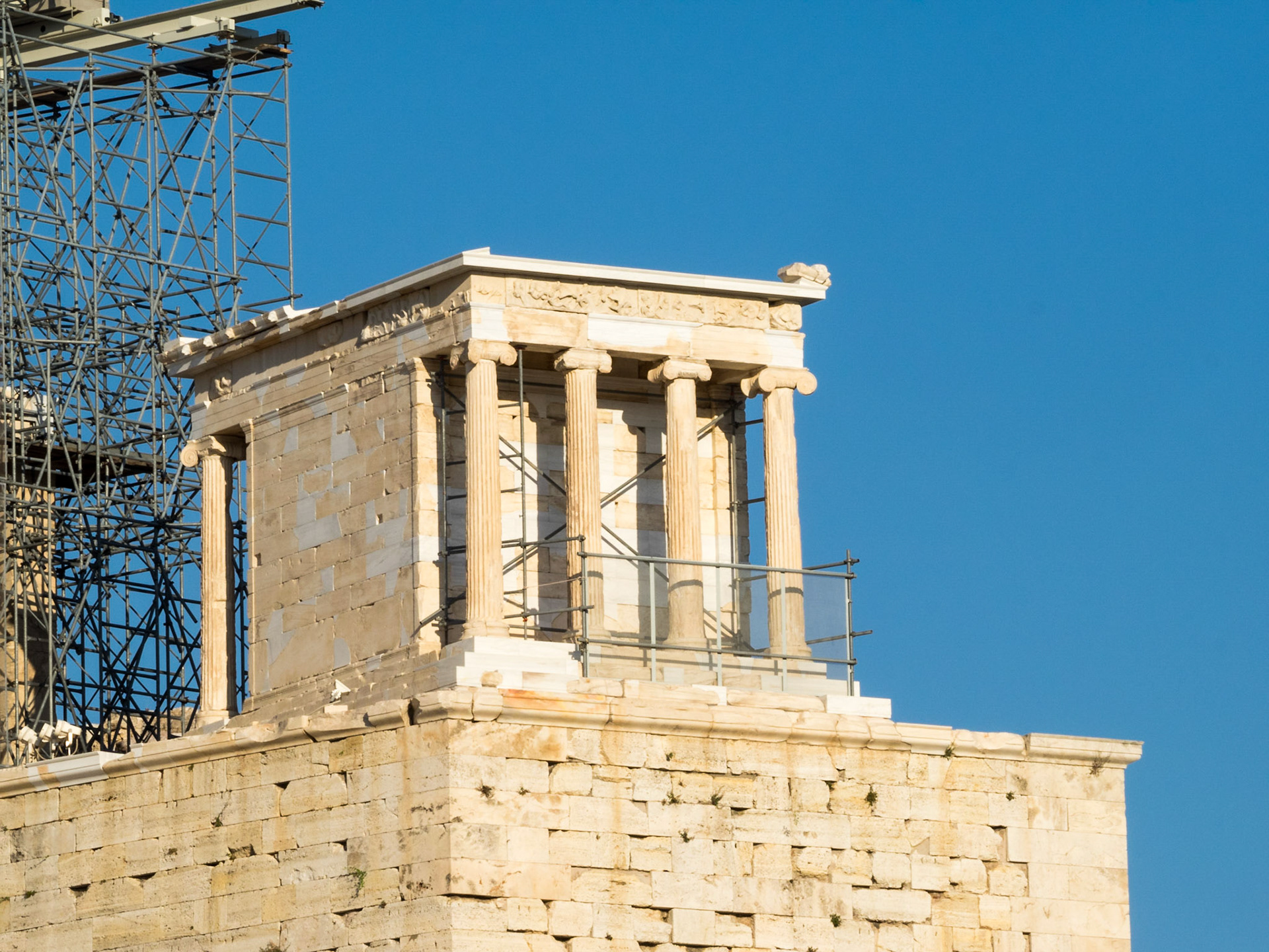 Contrast between the stone of the Temple of Athena Nike and the blue sky