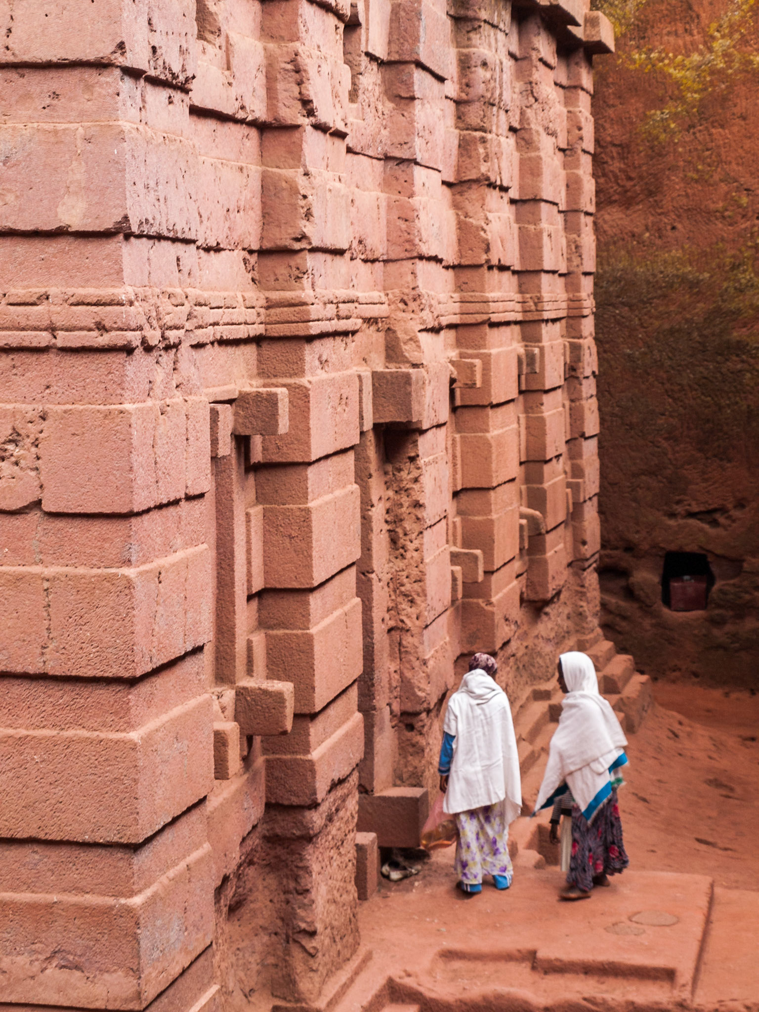 Pilgrims entering Bet Amanuel church in Lalibela