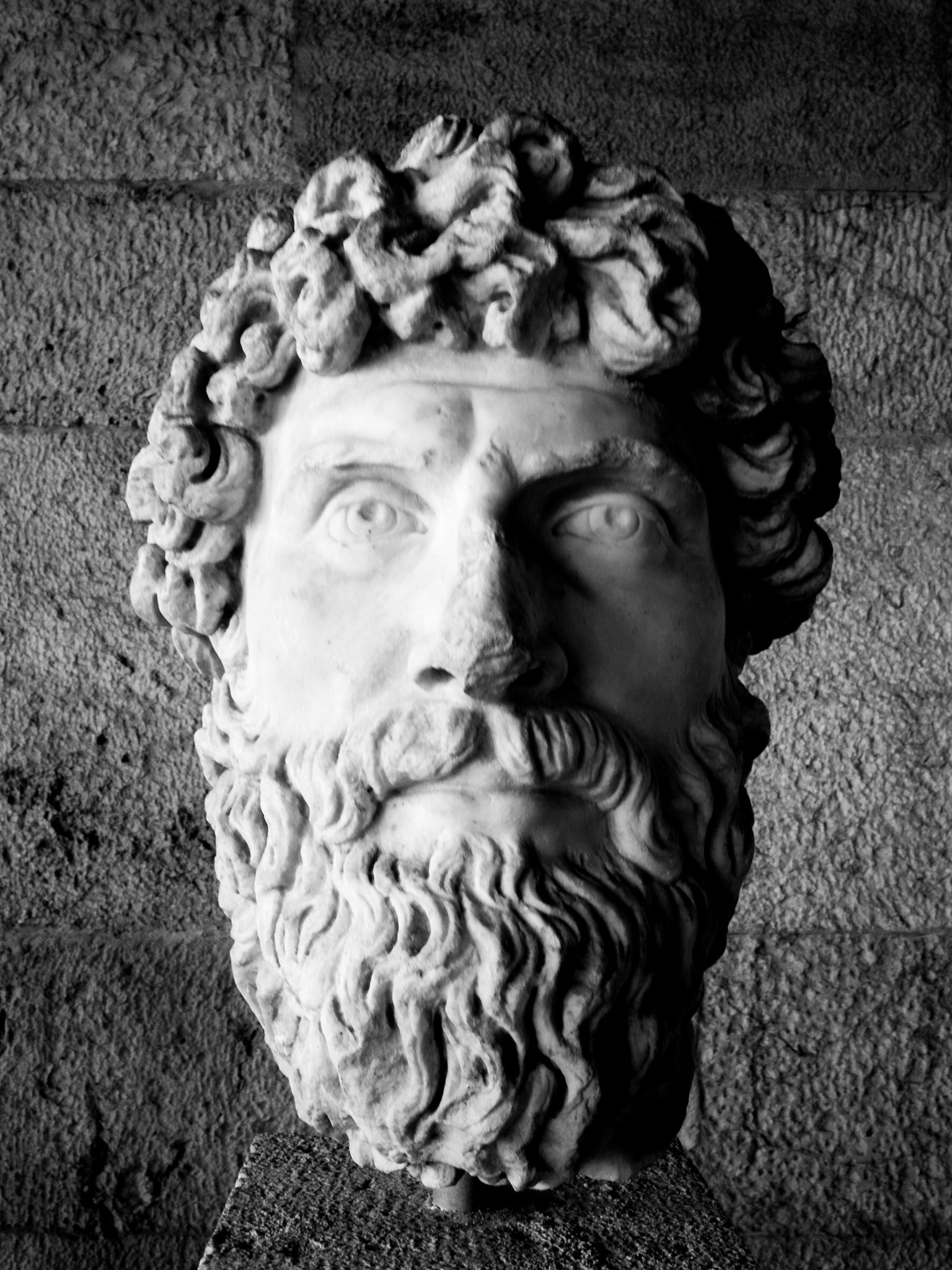 Man head sculpture in the Agora Museum