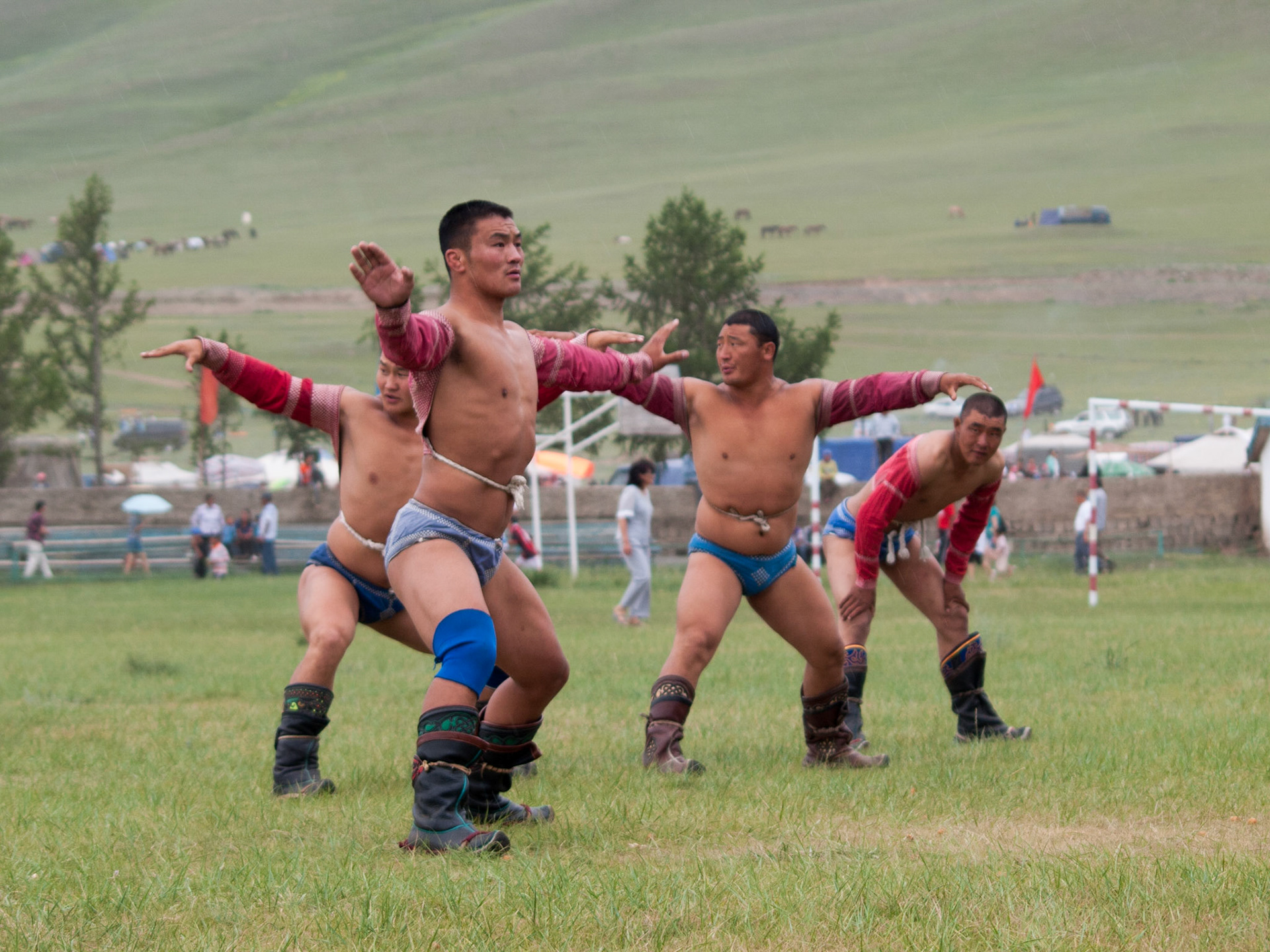 Wrestlers performing the eagle dance in Tsetserleg Naadam