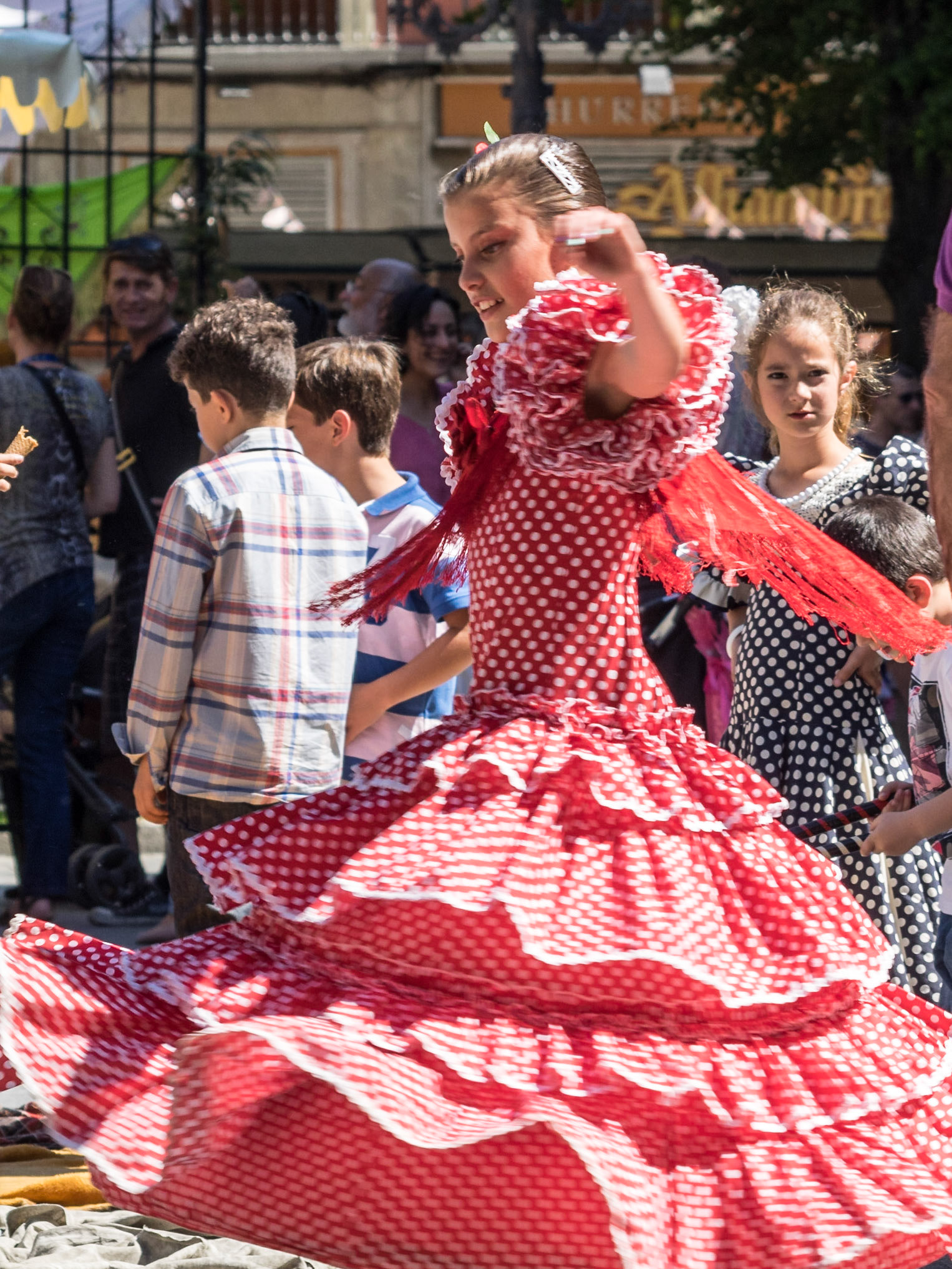 Street parade during the Las Cruces de Mayo in Granada