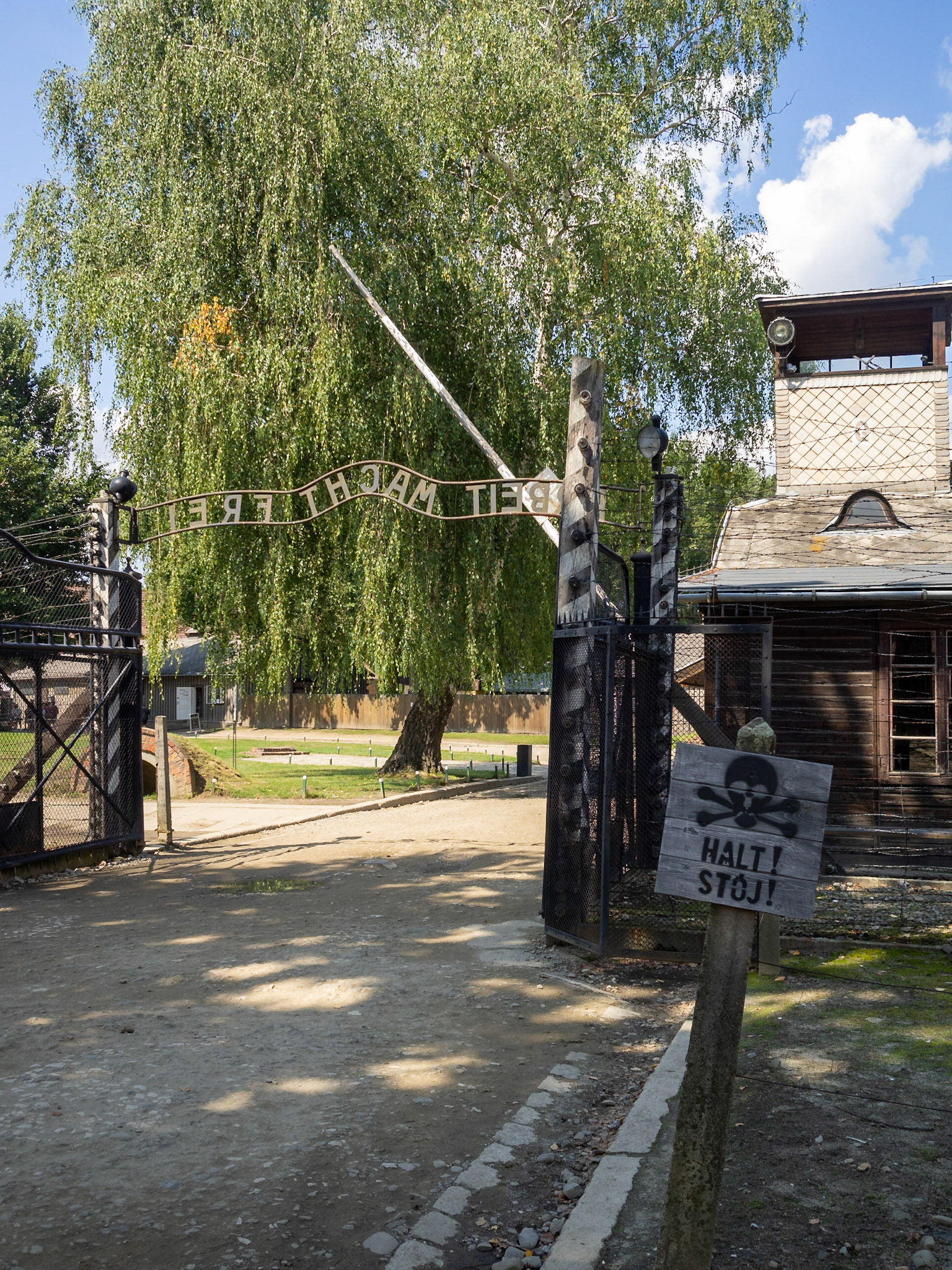 A danger sign by the gate of Auschwitz Concentration Camp