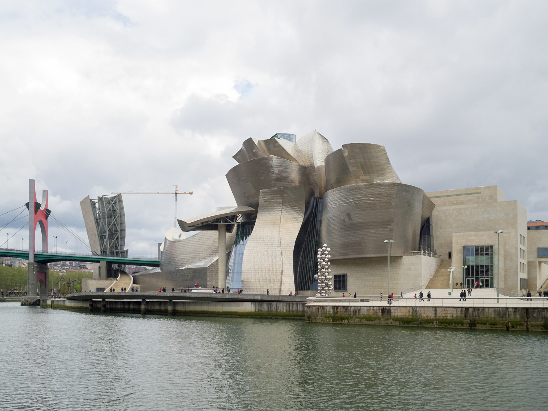 Guggenheim Bilbao Museum and La Salve Bridge by Nervion river