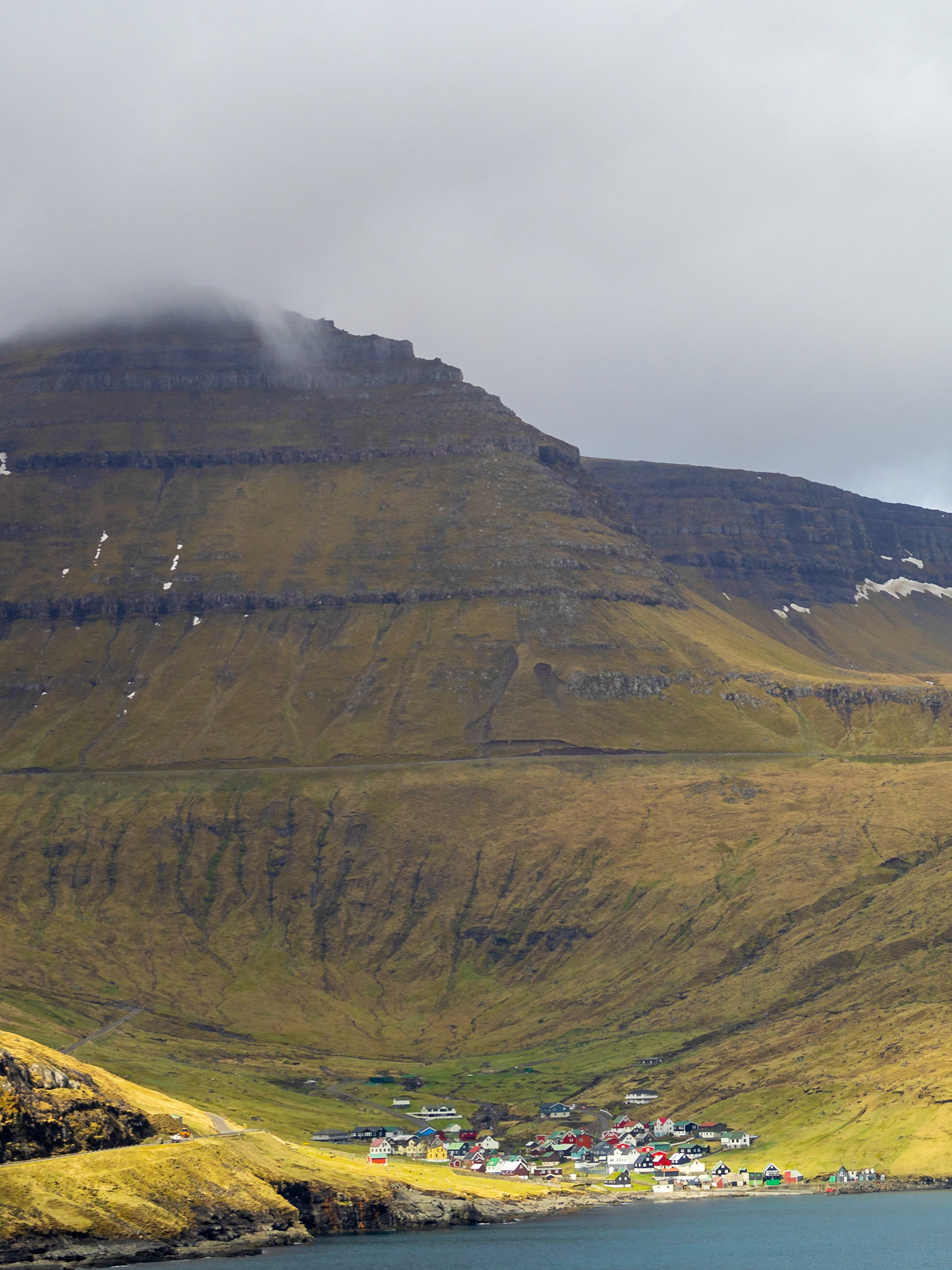 Funningur below Slættaratindur and by the Funningsfjørður fjord
