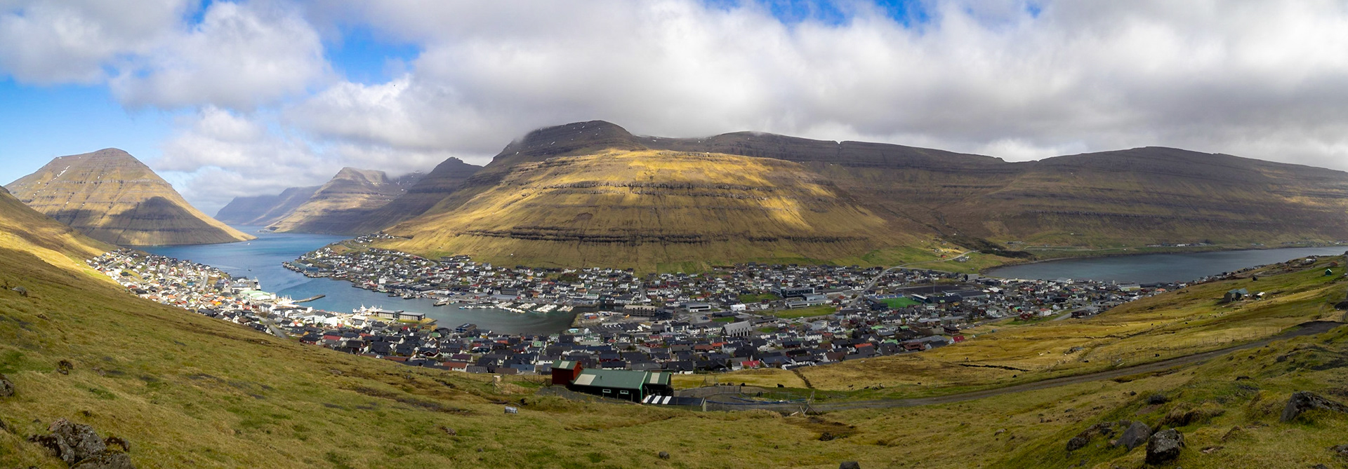 Panorama of Klaksvík below Kjølur mountain and by the fjord, seen from Klakkur