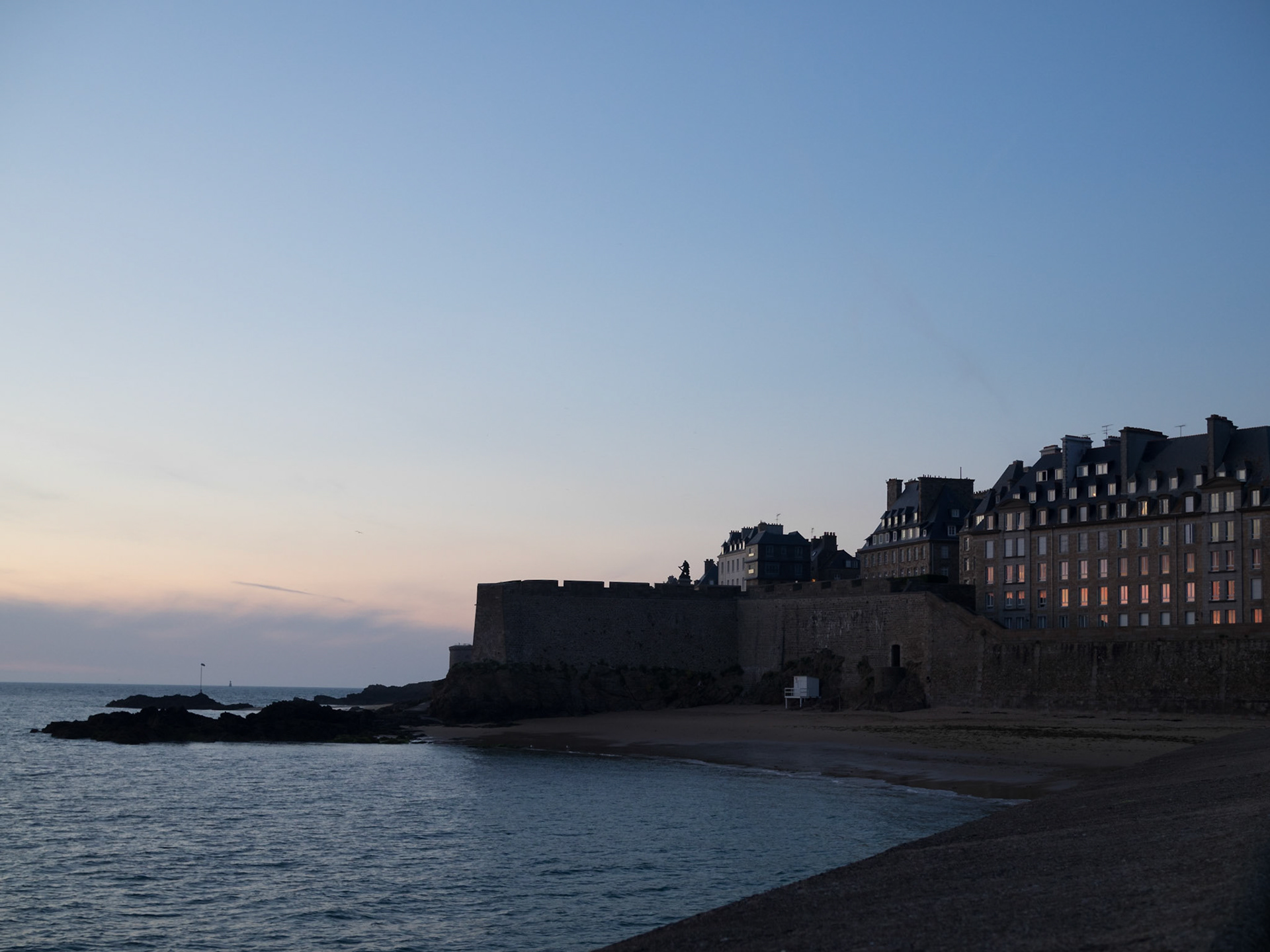Saint-Malo walled city silhouette at sunset