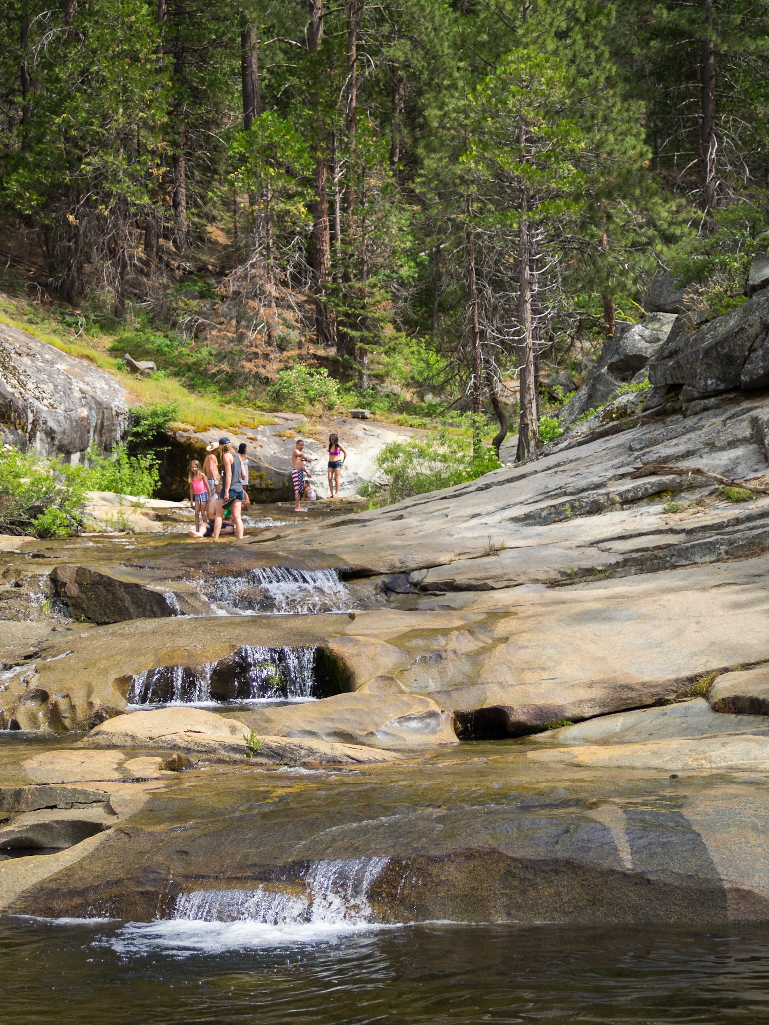 Having fun in the waterfalls of Hume Lake
