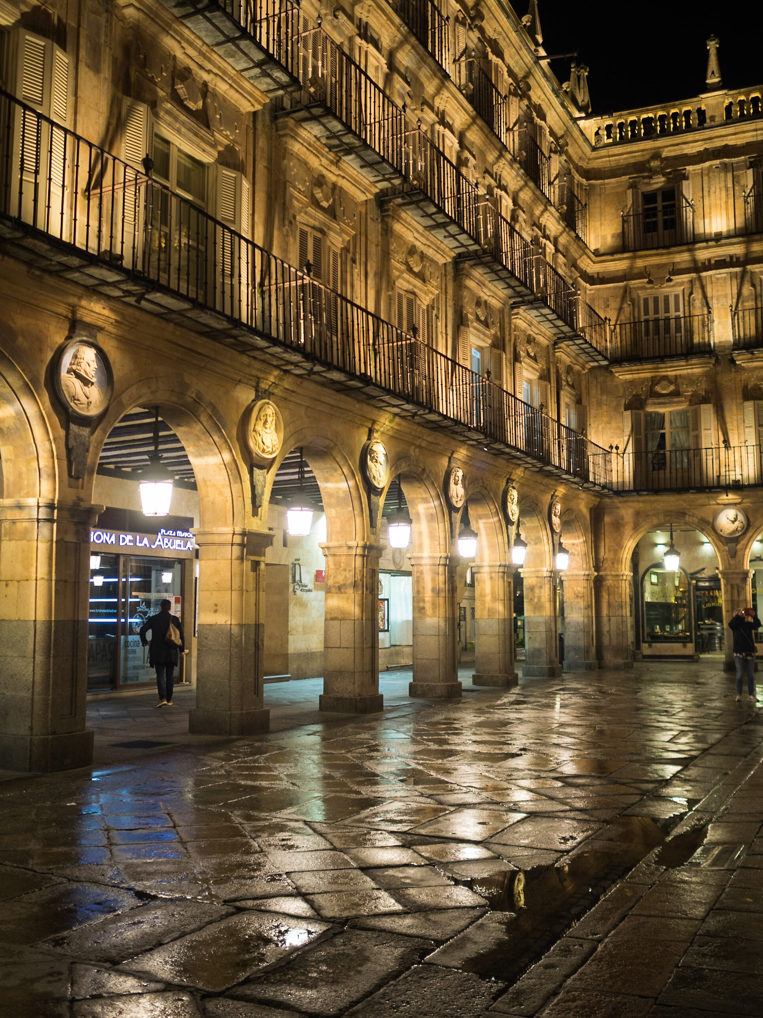 Salamanca Plaza Mayor reflectad on the wet stones