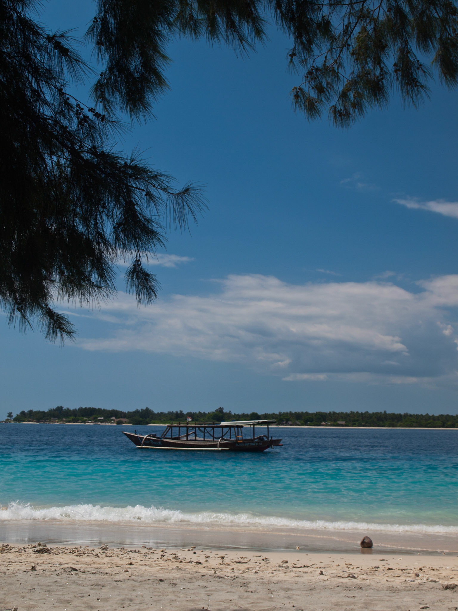 View of Gili Trawangan tropical sea beach with Gili Meno in background