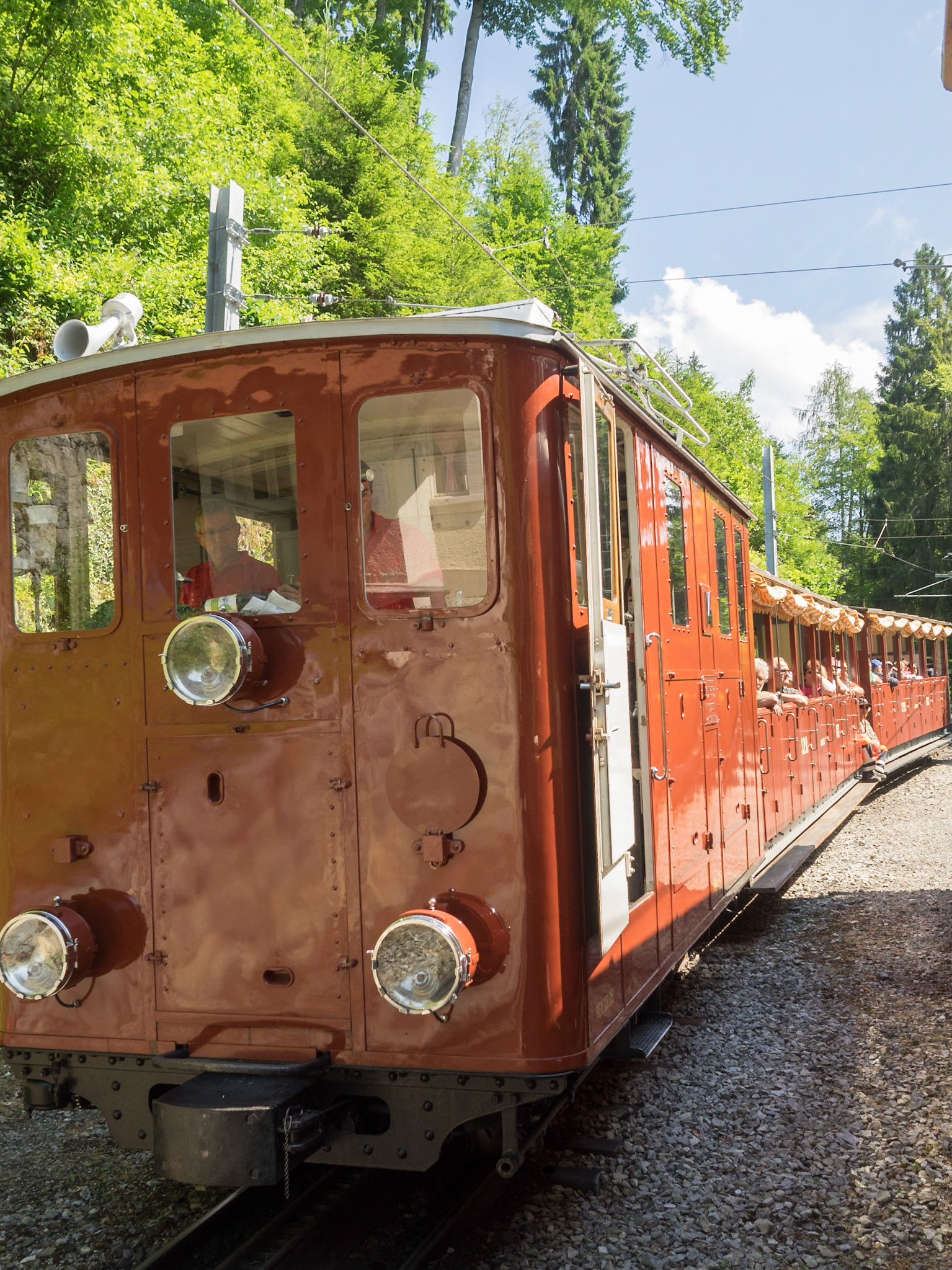 Tourists aboard Schynige Platte Railway