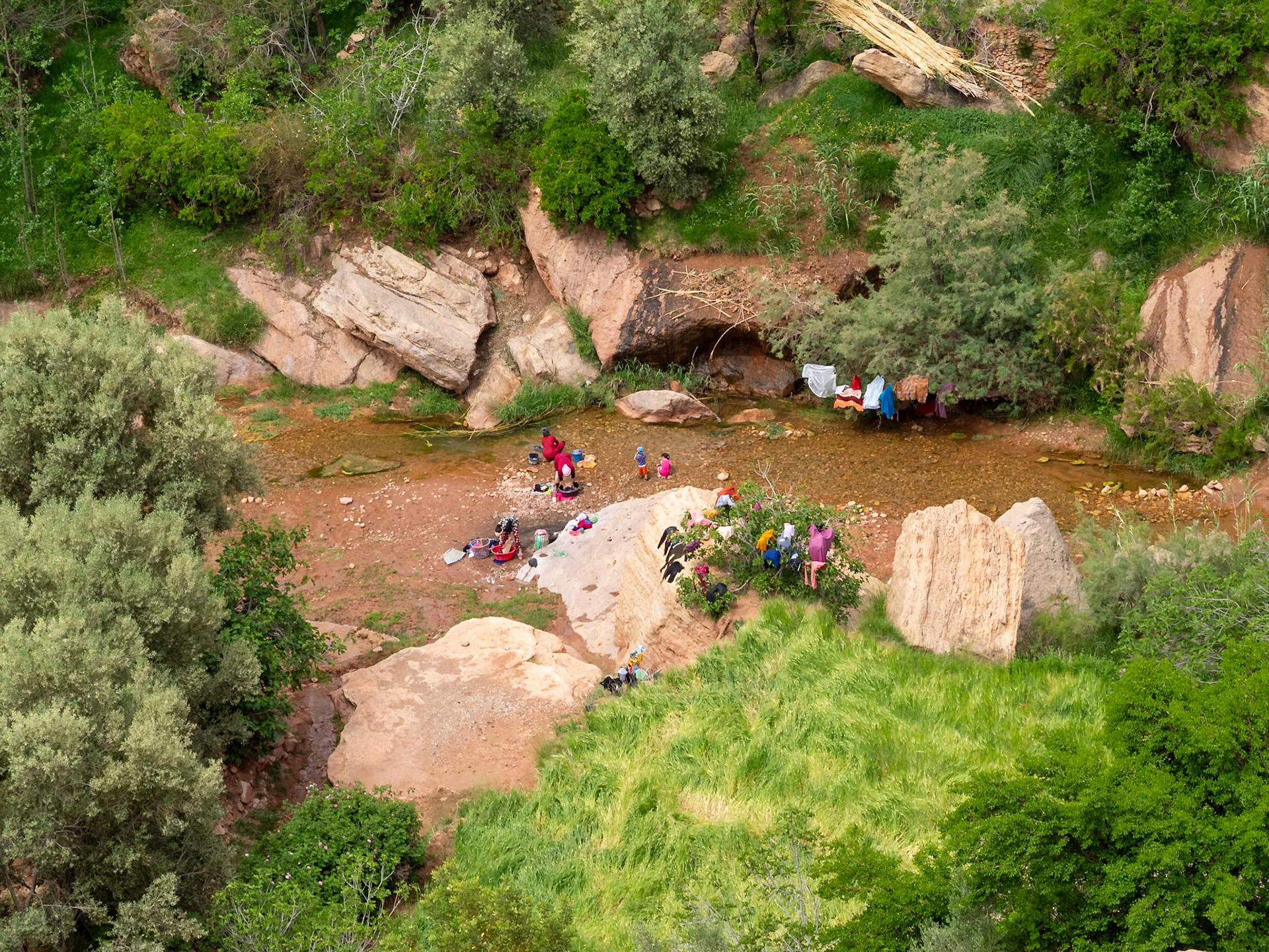 Washing clothes in the Ounila river, Morocco