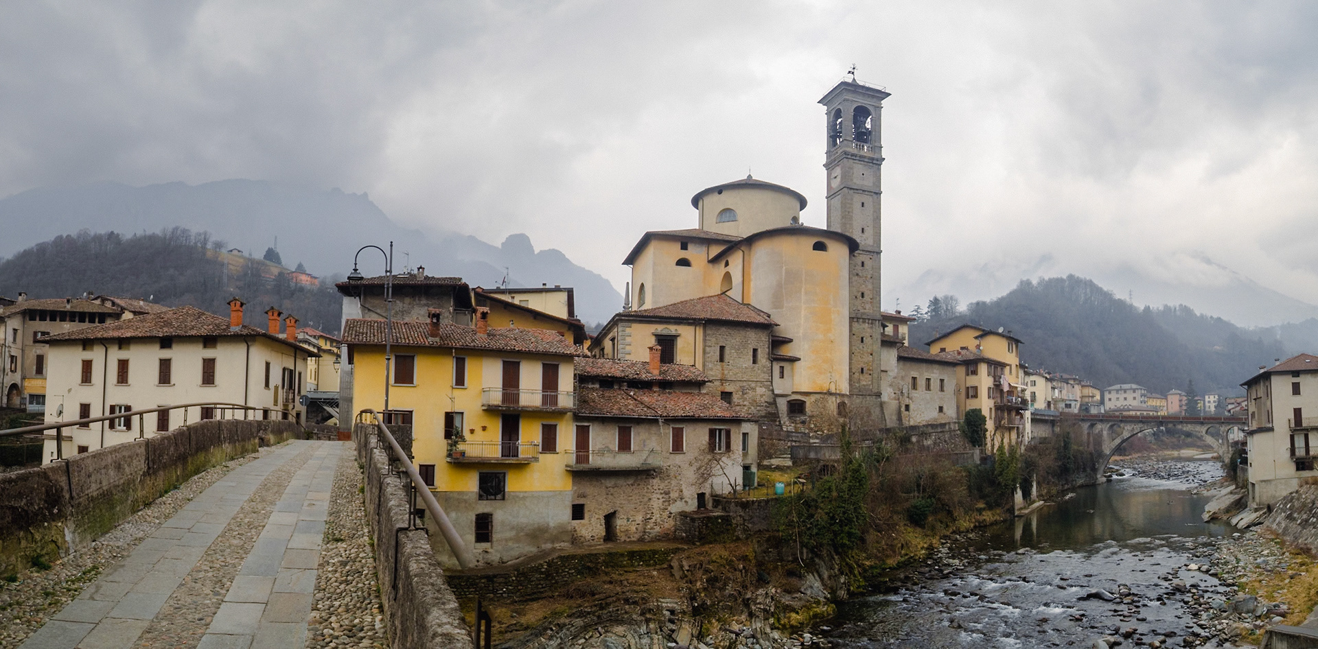 San Giovanni Bianco church and stone bridge over Brembo River, Lombardy