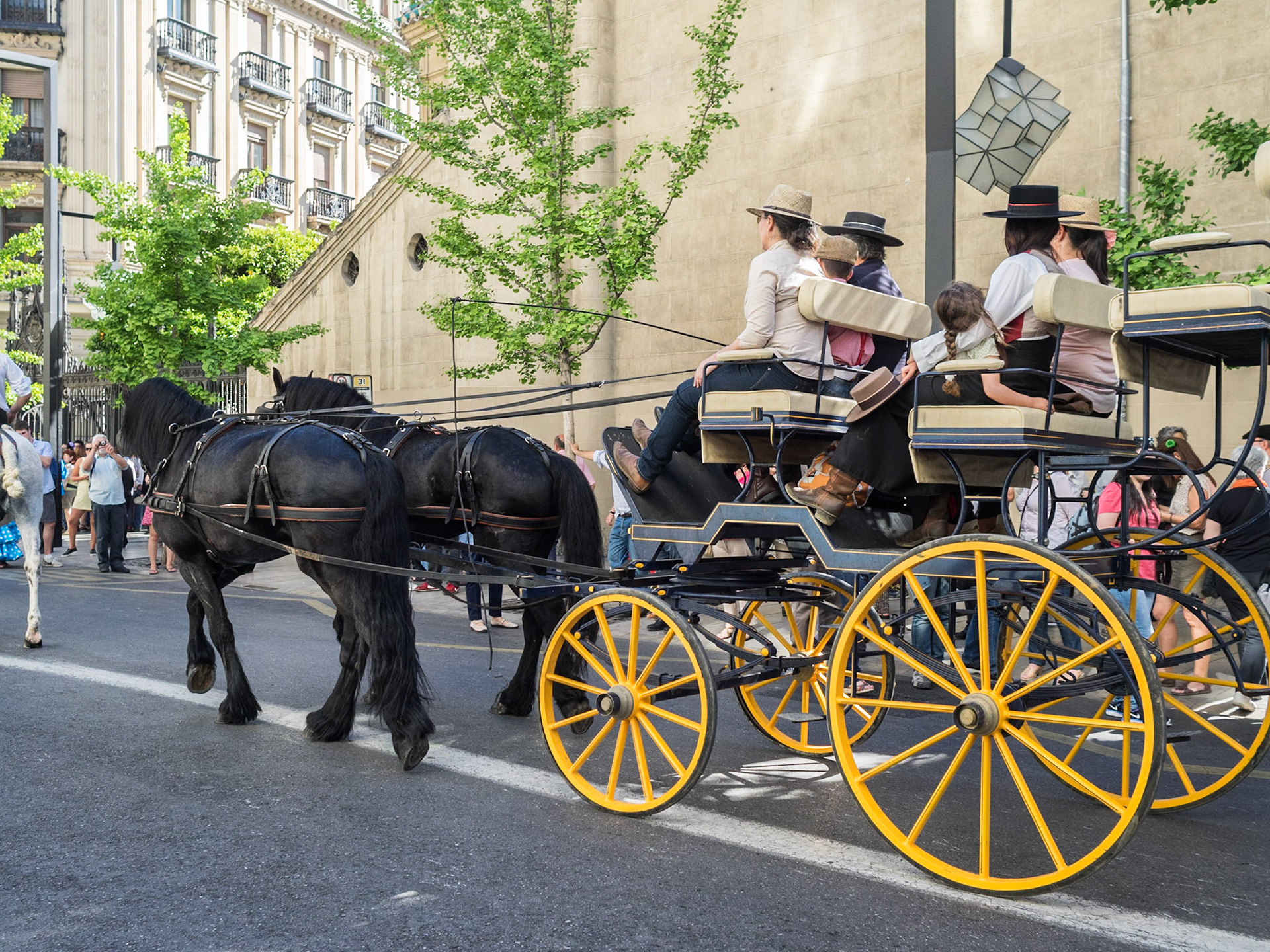 Street parade during the Las Cruces de Mayo in Granada