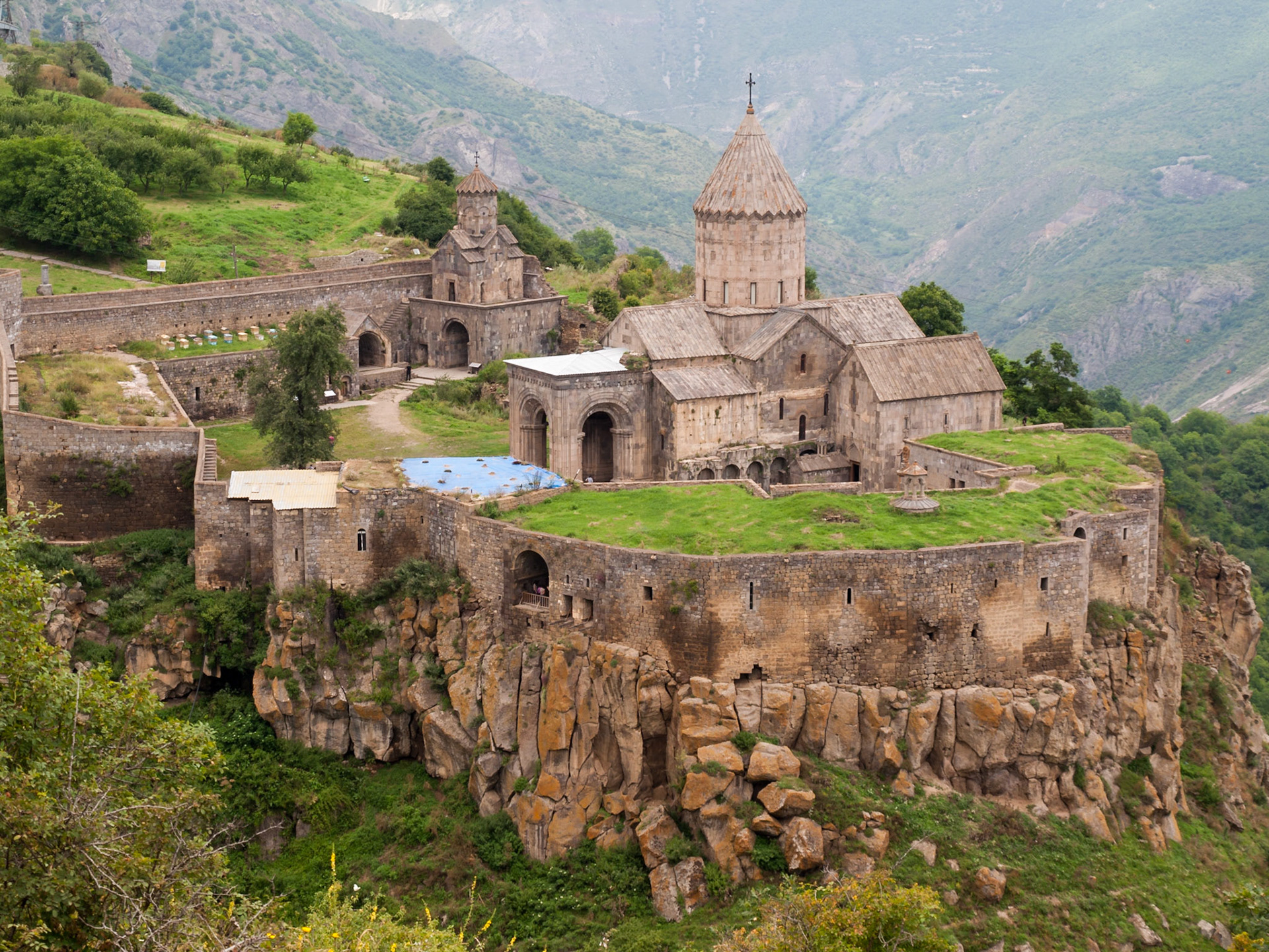 Tatev monastery on the rocky edge of the mountain