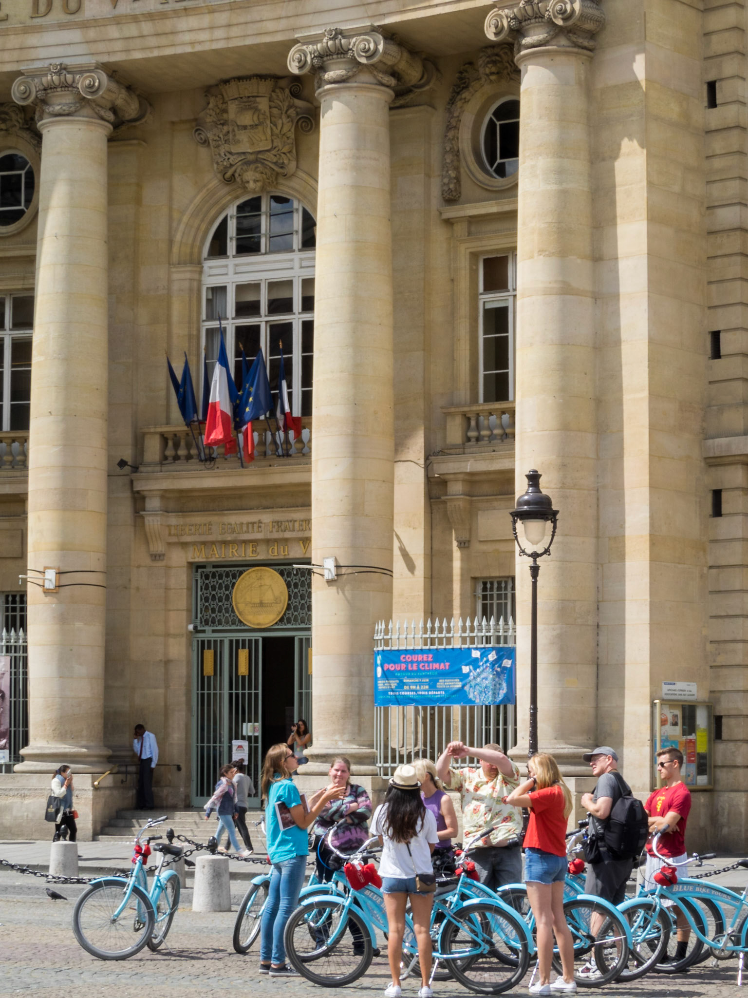 Cycling tourist group in the Paris streets