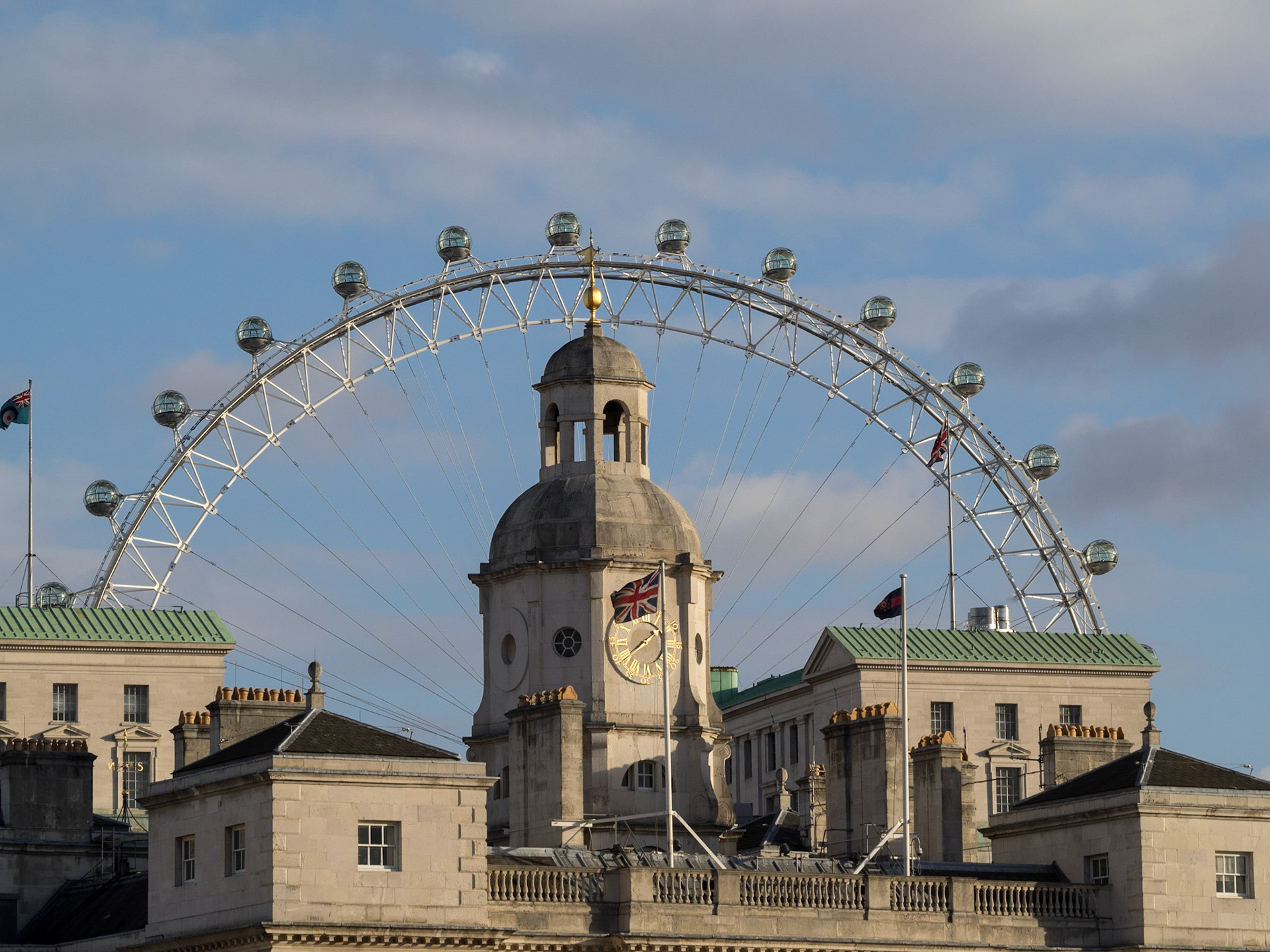 The London eye seen over the roofs