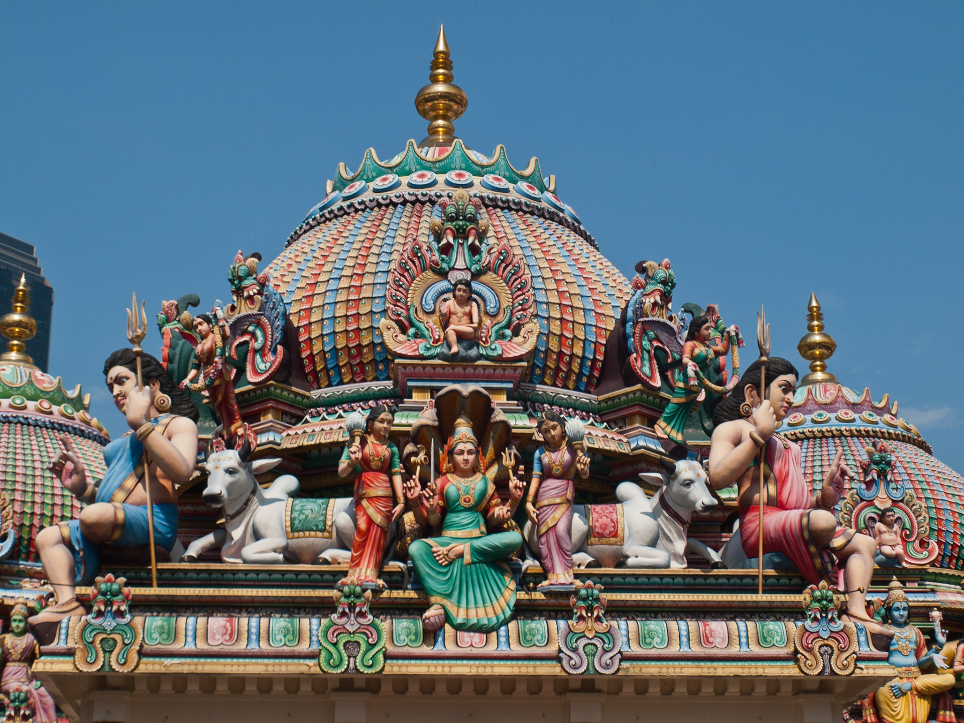 Colorful god's sculpture in Sri Mariamman Temple