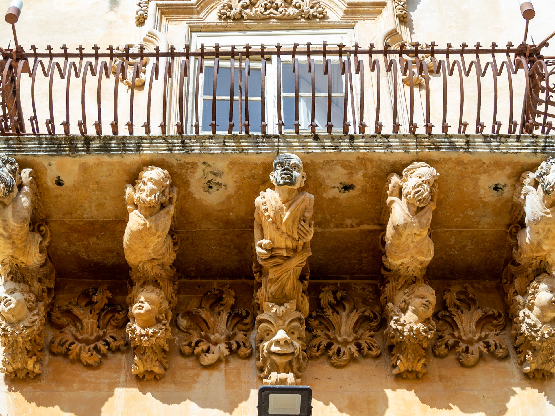 Baroque Palazzo Nicolaci stone carved balcony, Noto