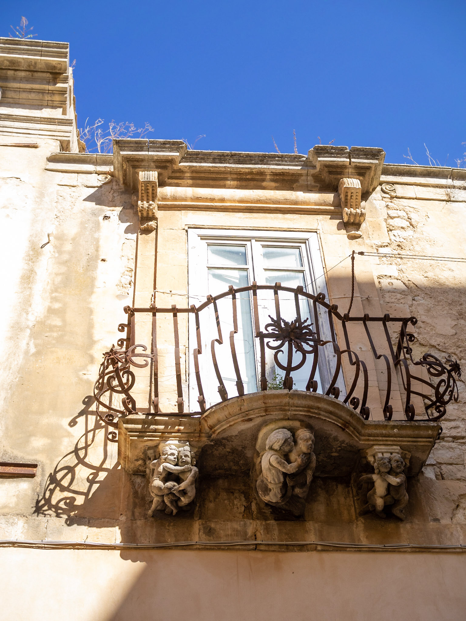 Stone carved balcony from Palazzo la Rocca, Ragusa Ibla