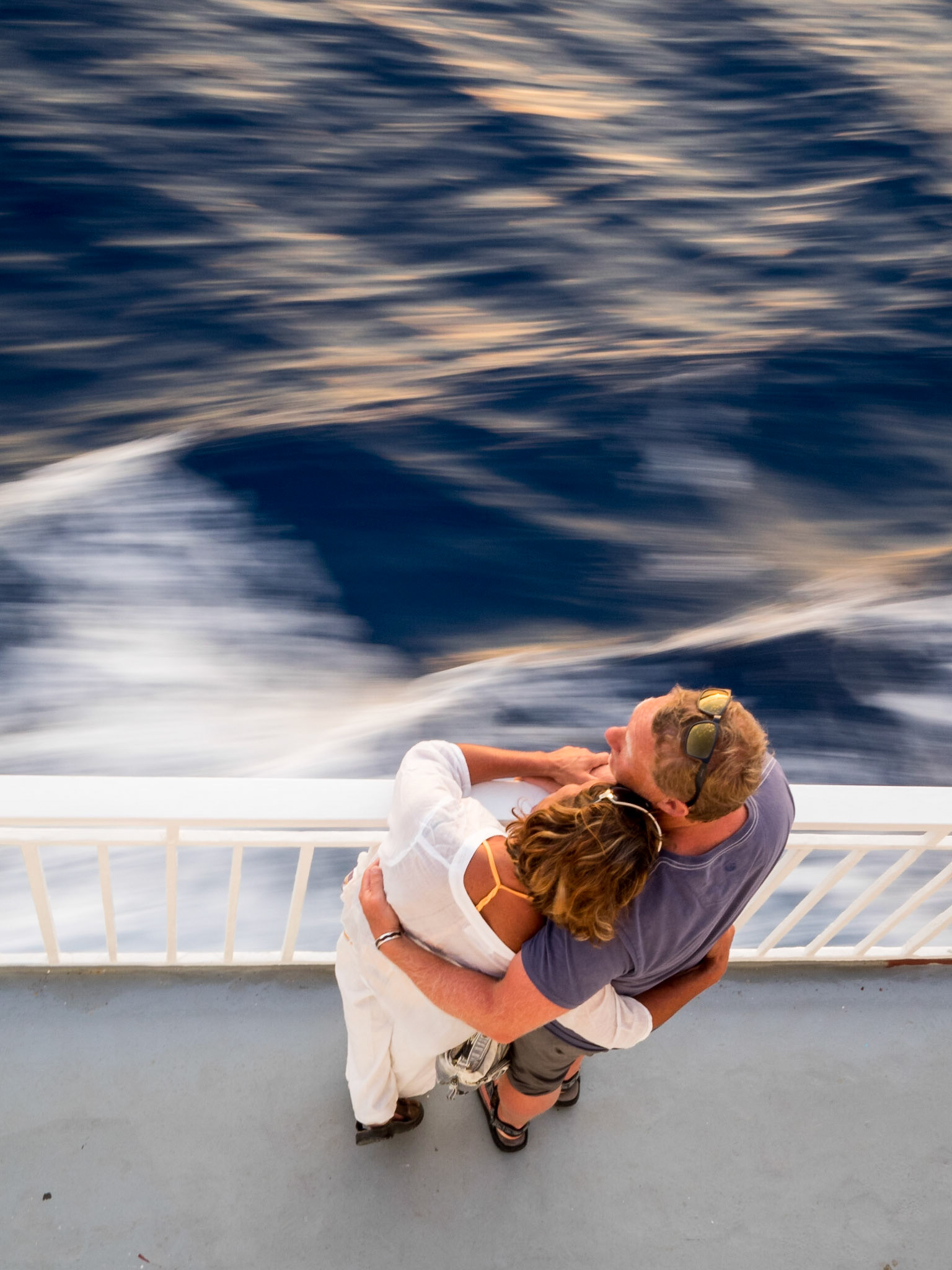 Couple embracing each other in a boat trip