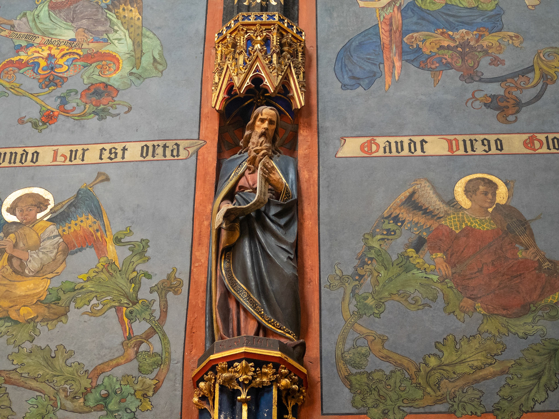 Saint images on the wall of St. Mary's Basilica, Krakow