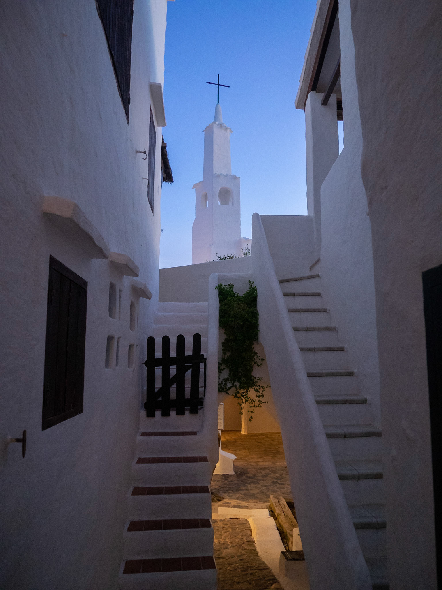 Binibeca church tower between the white houses, Menorca