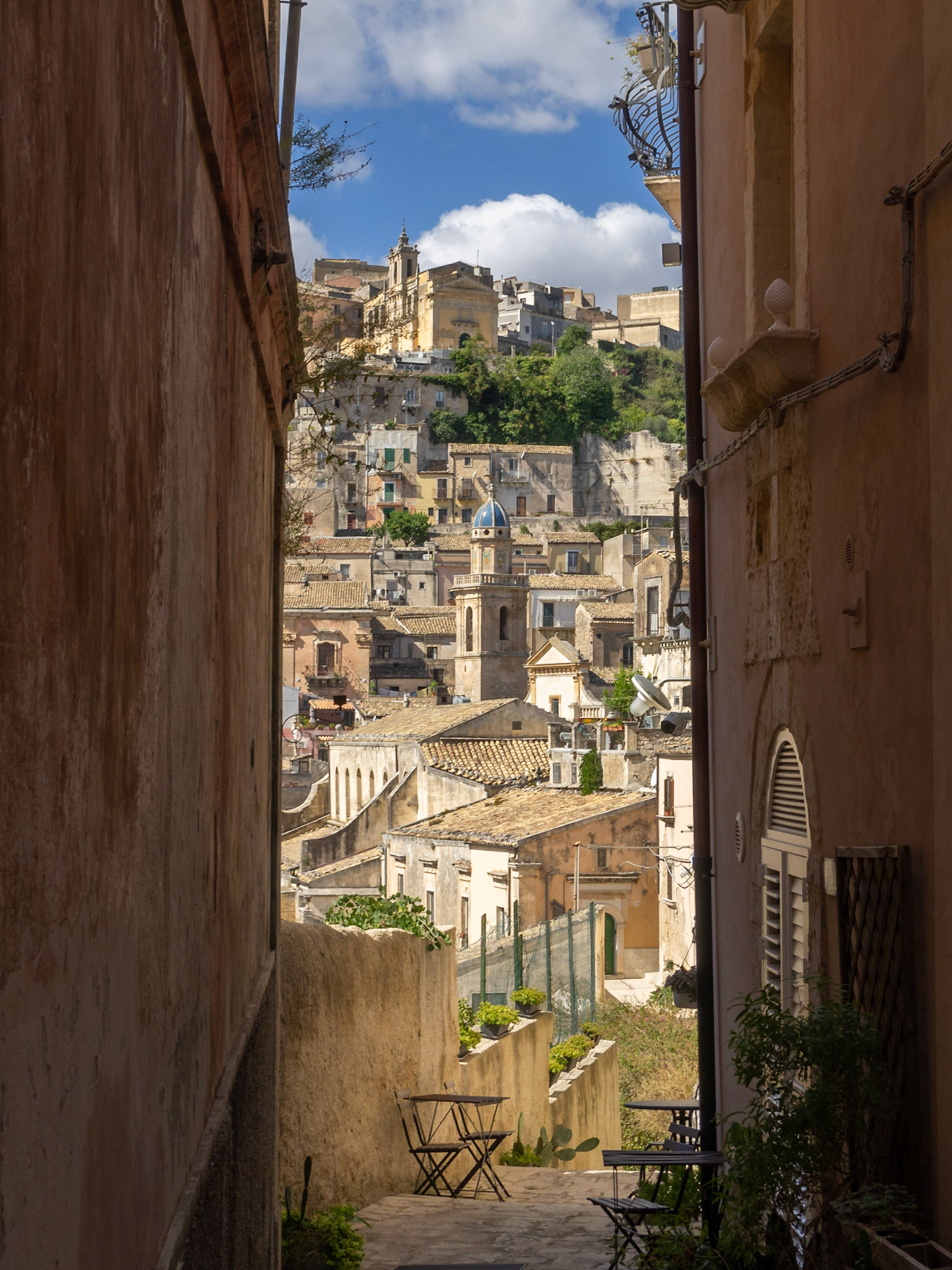 Chiesa di Santa Lucia and Chiesa di Santa Maria dell'Itria seen from a narro street of Ragusa Ibla